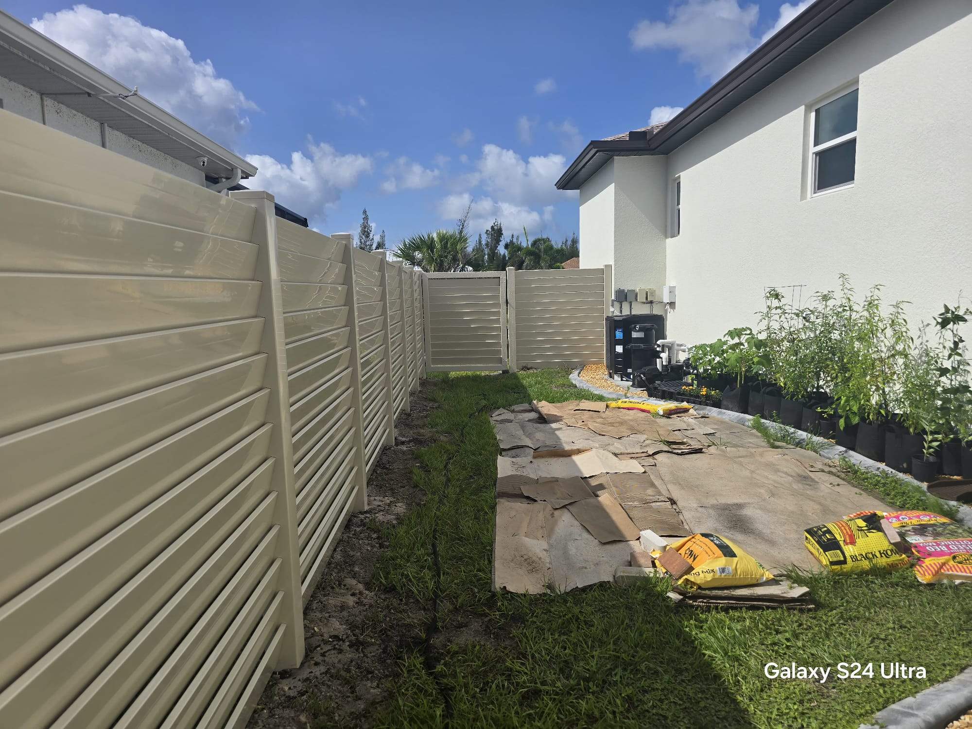 Tan Louvered Vinyl in Port Charlotte by True Fence LLC