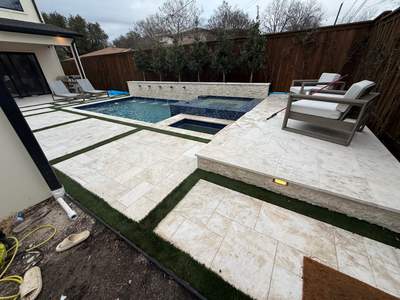 Modern Geometric Pool and Spa with Turf-Strip Decking