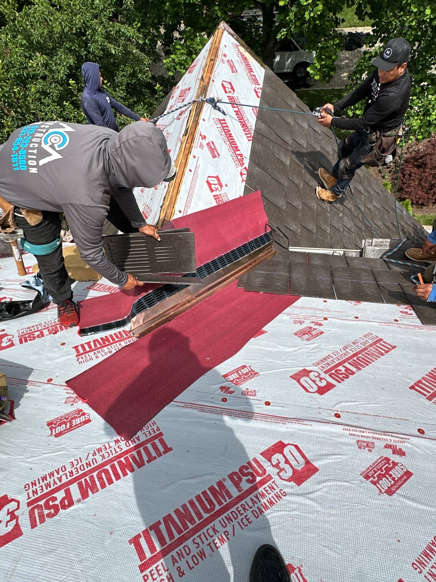 Residential Roofing Installation Using Enviroshake Synthetic Slate by Undersun Roofing 