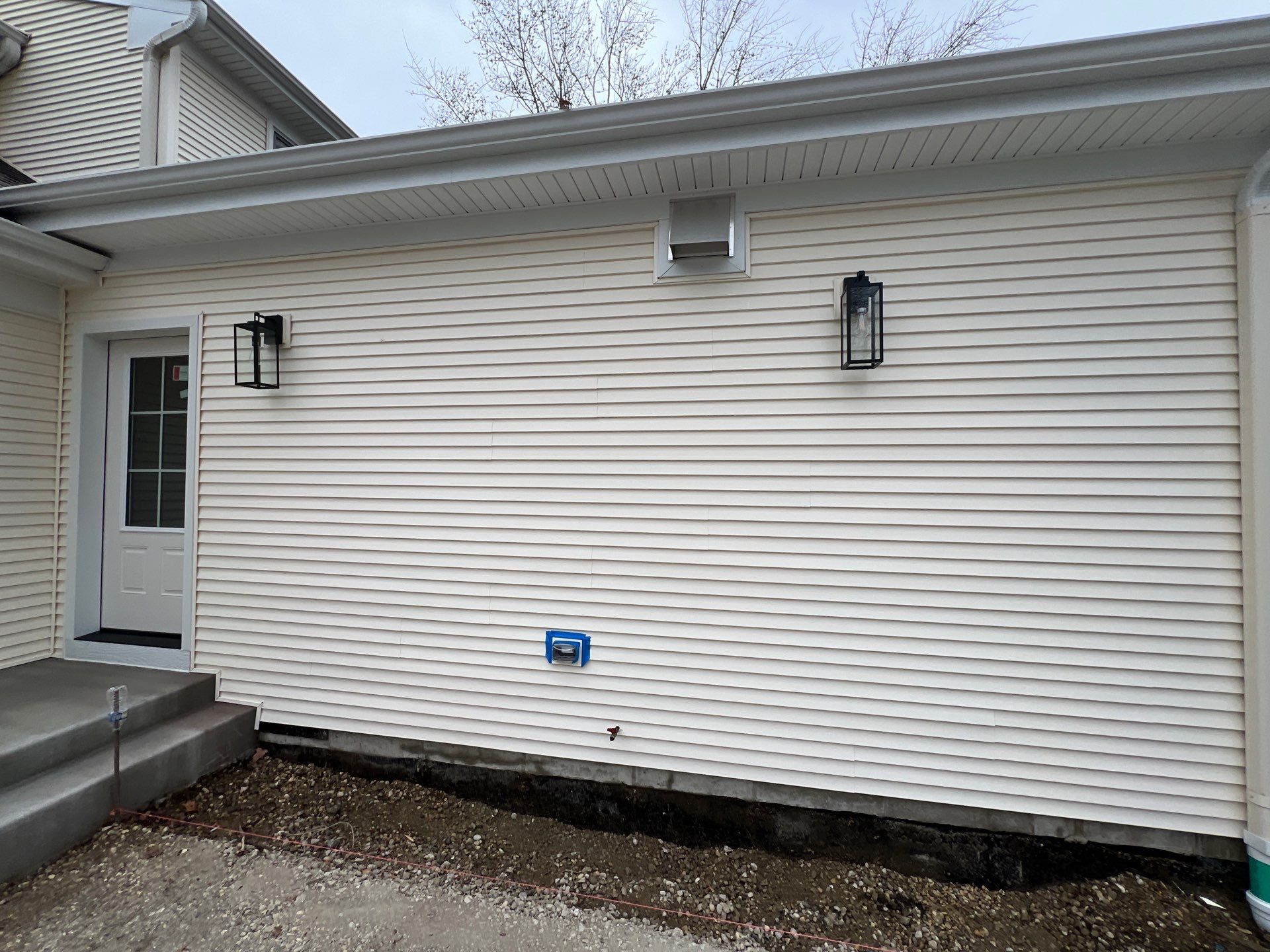 Housewashing  using Algaecide, soft wash soap by Northern Power Washing LLC.