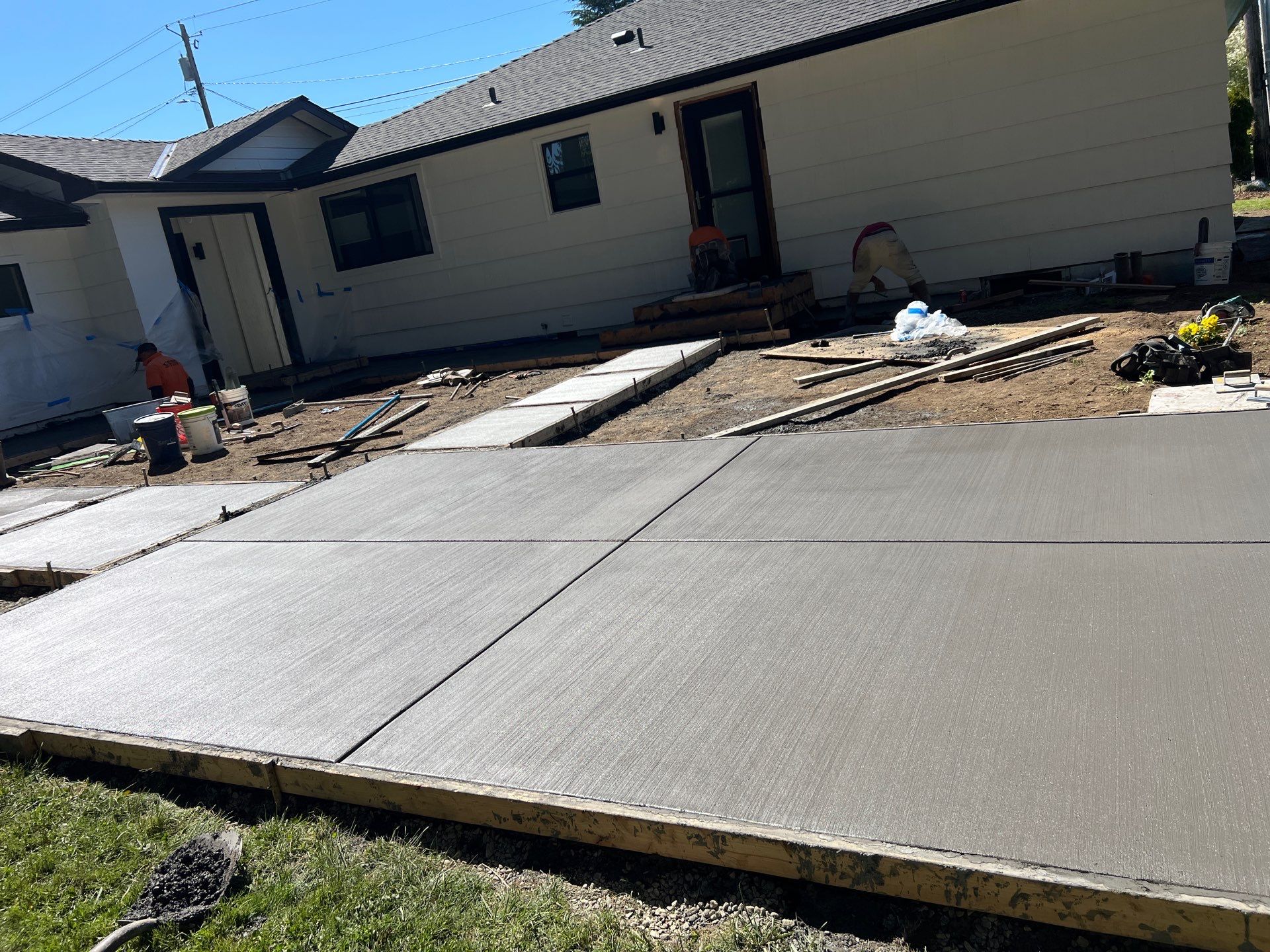 John | Concrete Backyard Walkway by Jireh Asphalt & Concrete Inc 