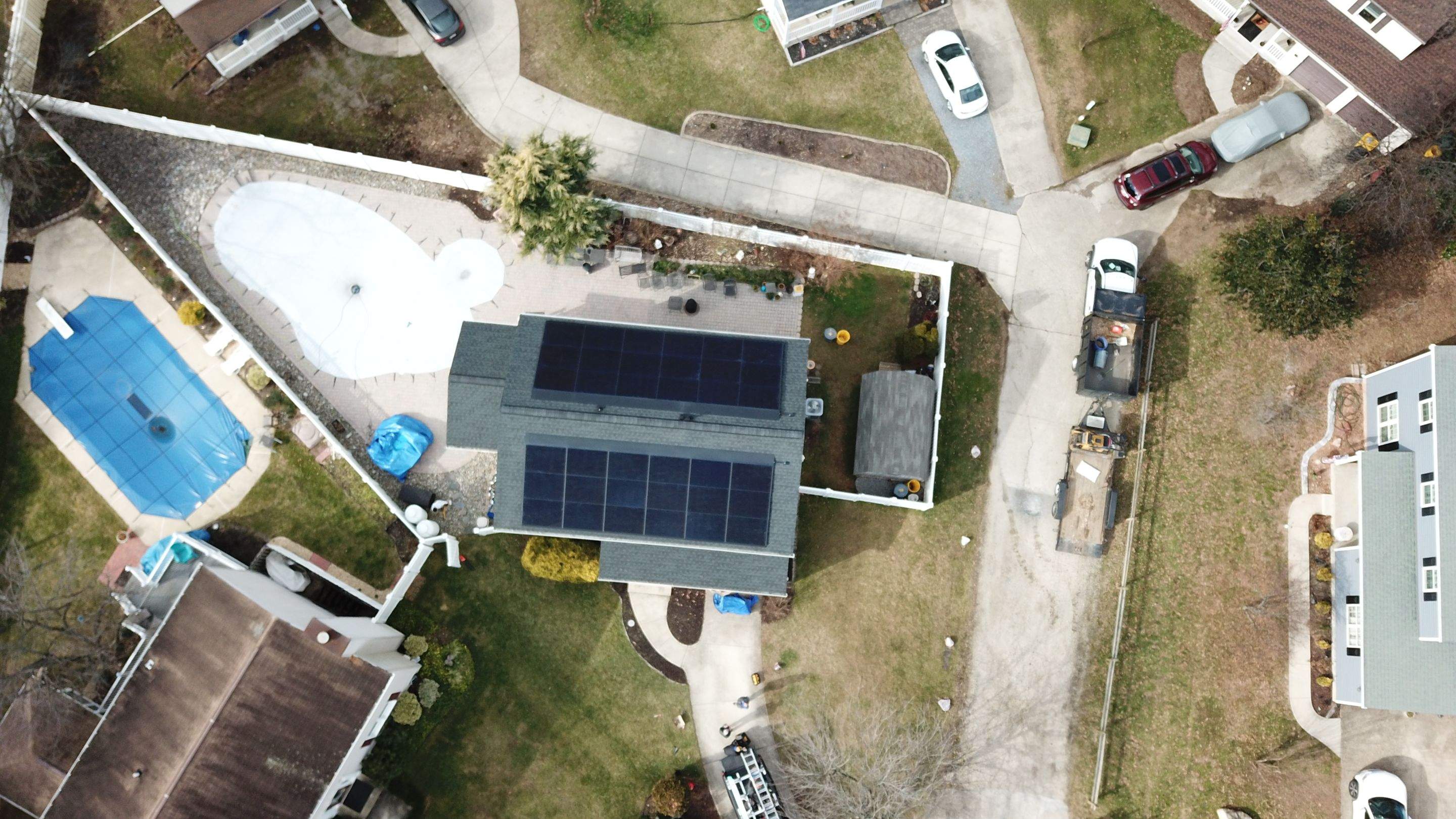 Roof Replacement with GAF Decotech integrated solar panels by American Home Contractors