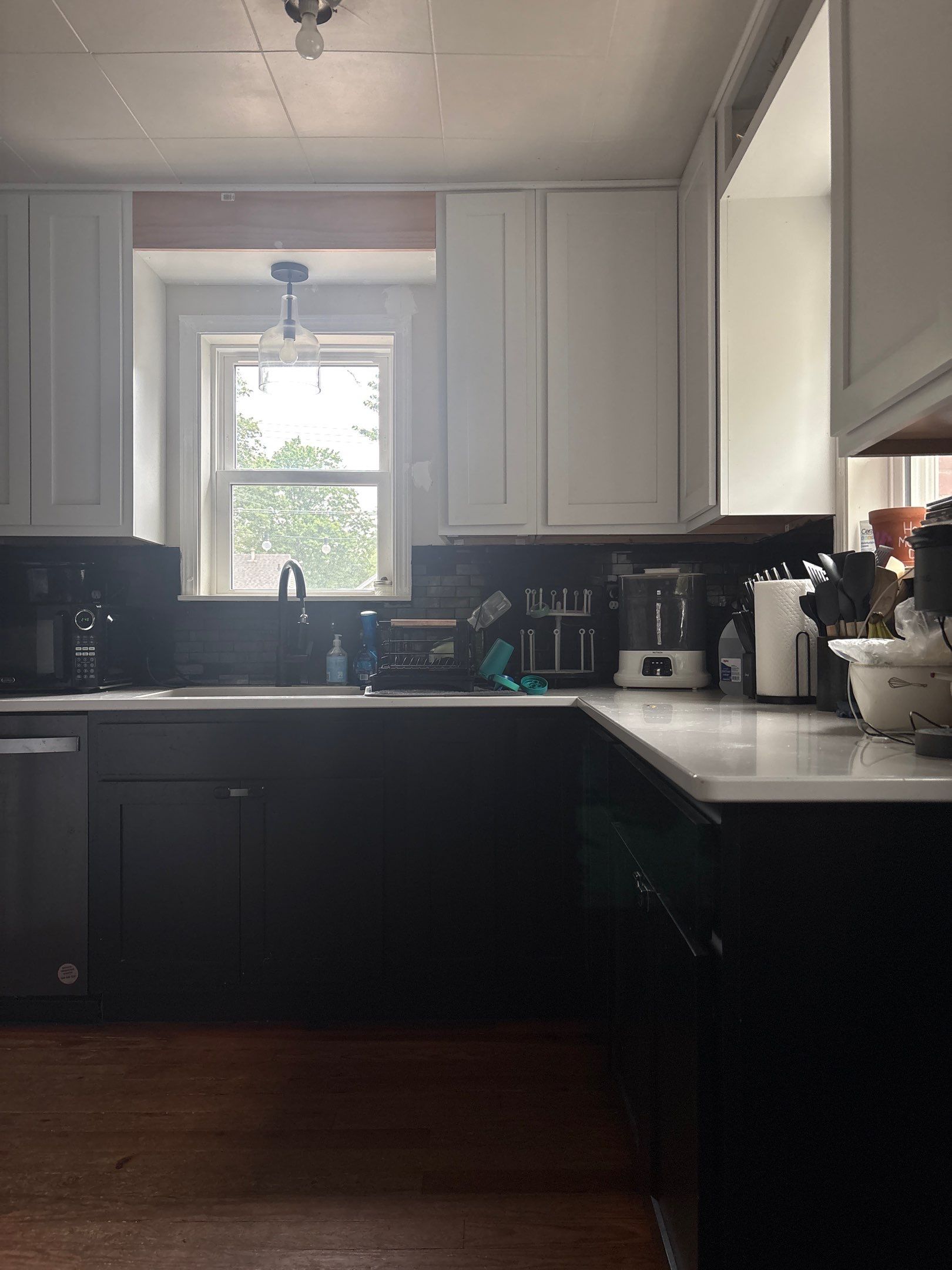 Modern Kitchen Renovation with Two-Tone Cabinetry and Quartz Countertops by CompanyCam Sales Demo