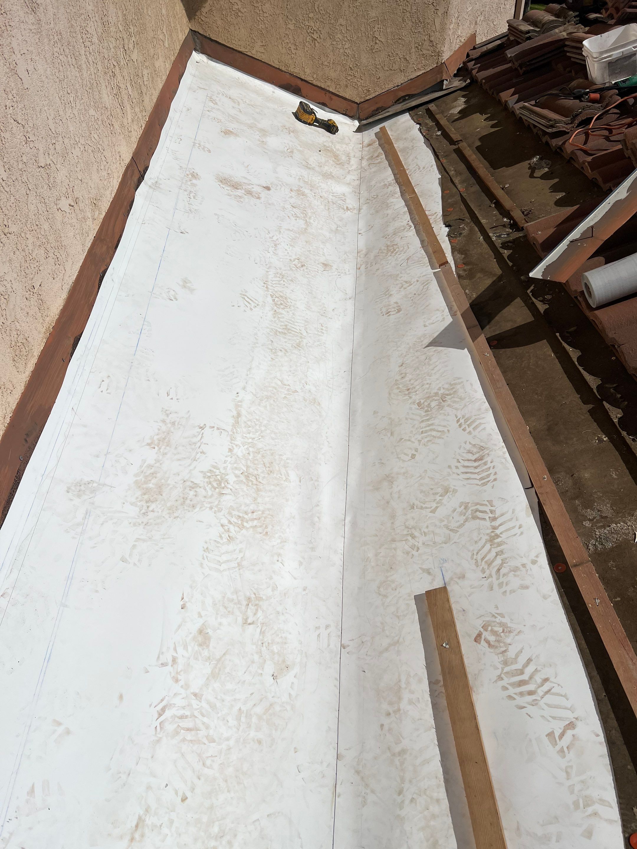 Tile Roof repair by Grandmark Service Company