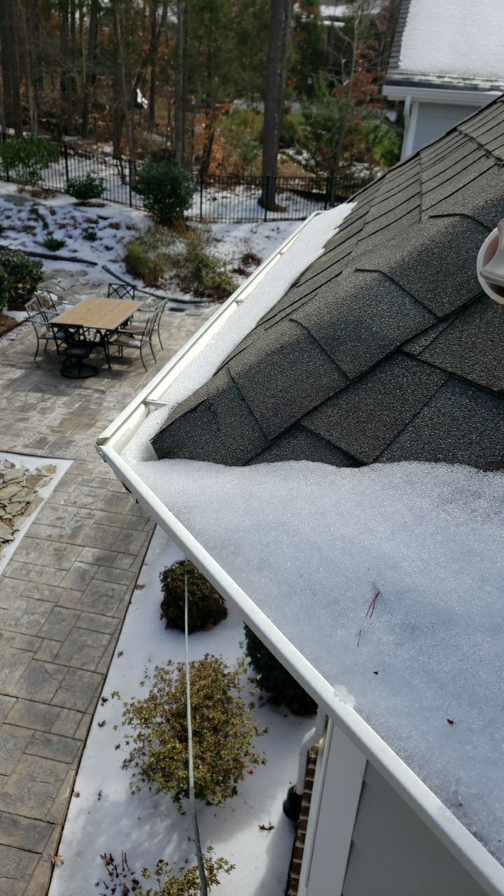 Gutter Cleaning using water by Power Wash Masters LLC