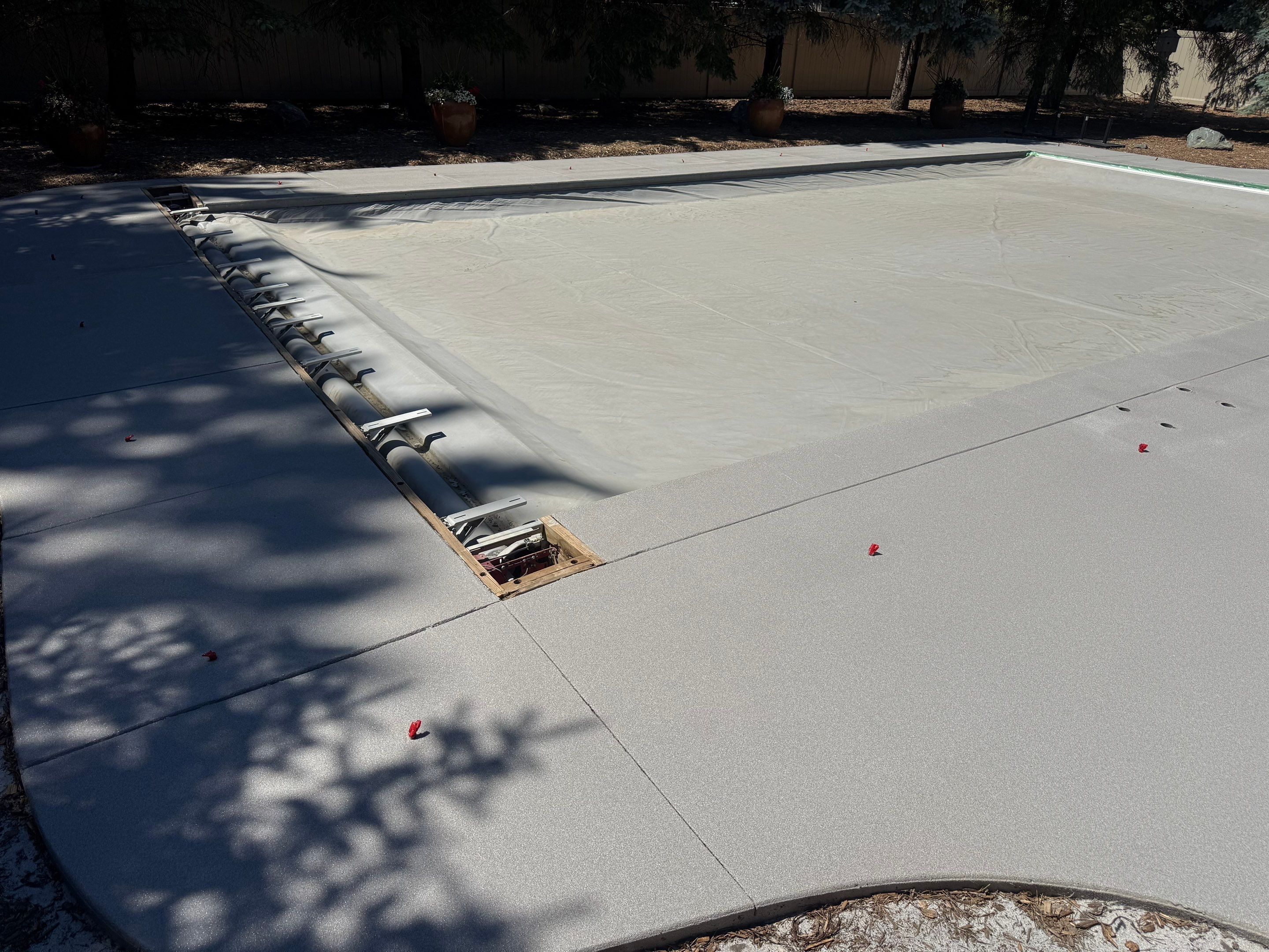 Decorative Concrete Pool Deck and Patio Resurfacing in Sioux Falls by Select Painting, Coatings & Garage Cabinets