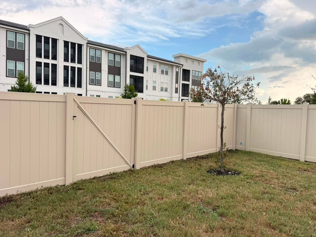 Tan Vinyl Privacy Fence Installation for Sarasota Home by True Fence LLC
