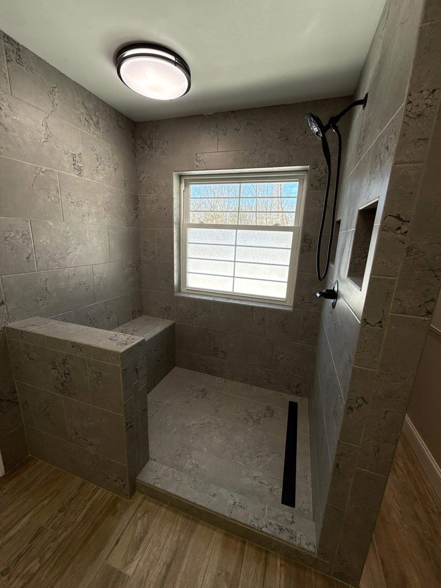 Burns/Olsen Shower Remodel by Integrity Tile and Home LLC