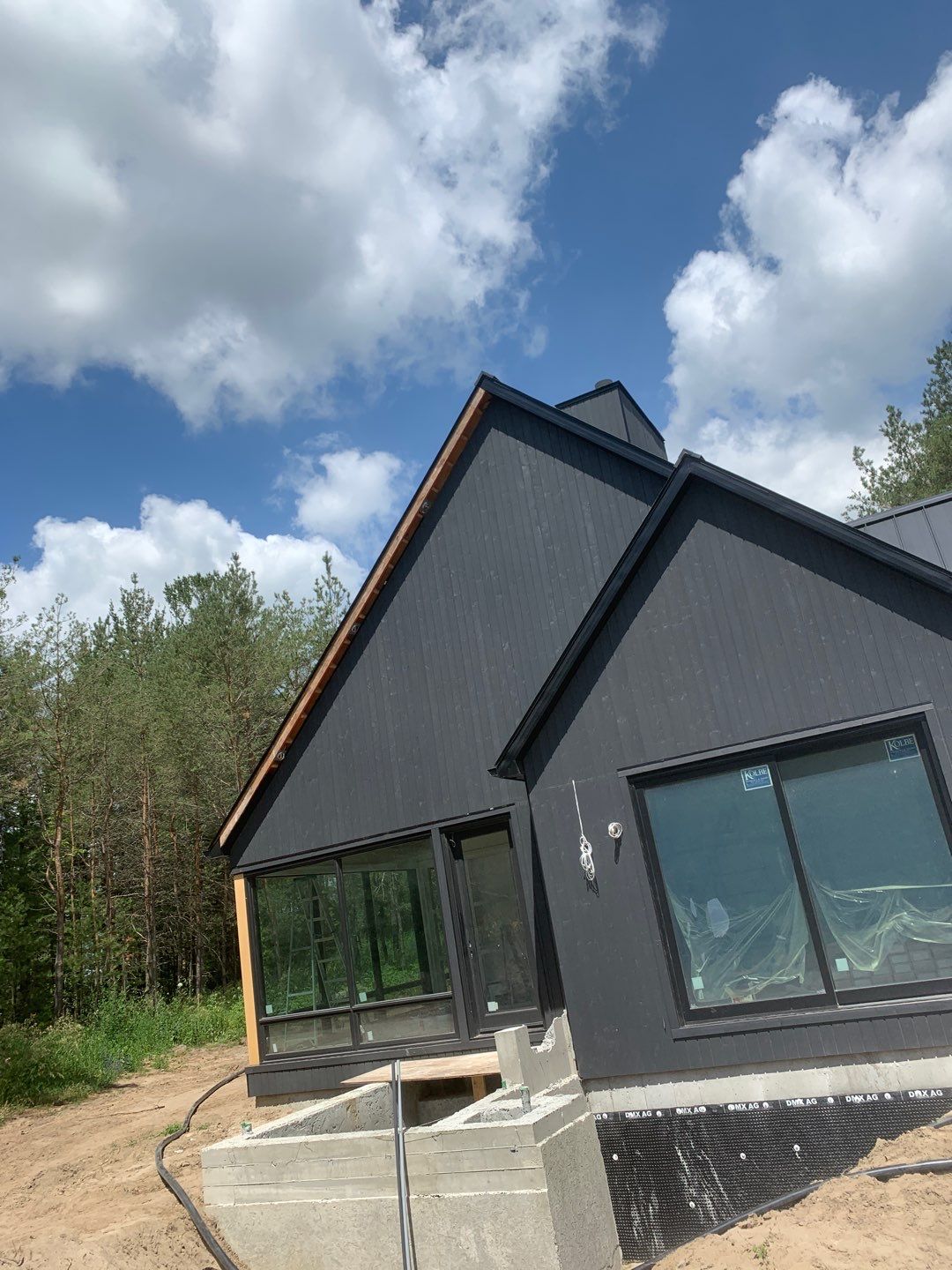 New Home Construction using 16" Standing Seam Panels by Jay Carter Roofing & Sheet Metal