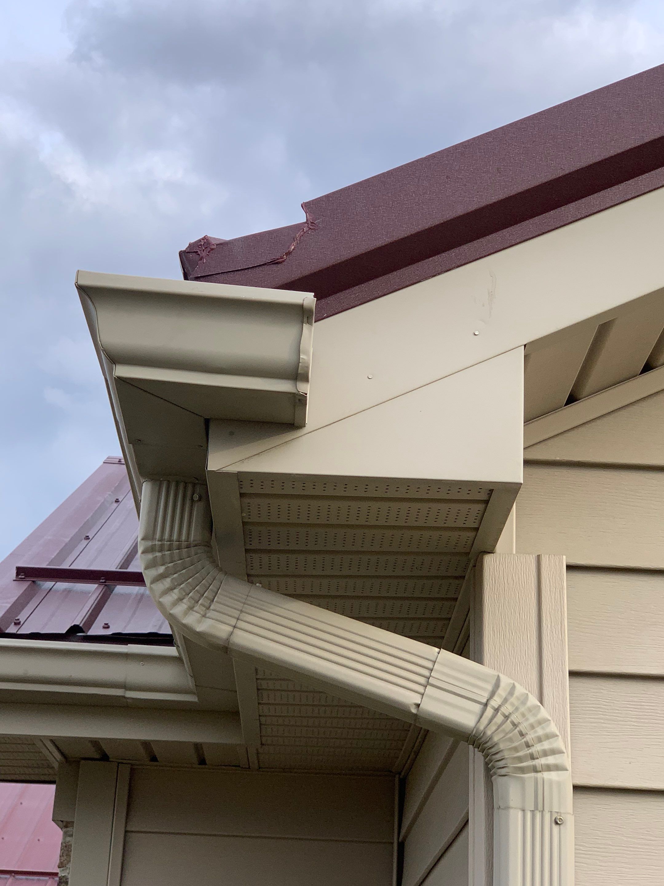 Burgundy Exposed Fastener Metal Roof in Columbia City, Indiana Country Home by 4Ever Metal Roofing
