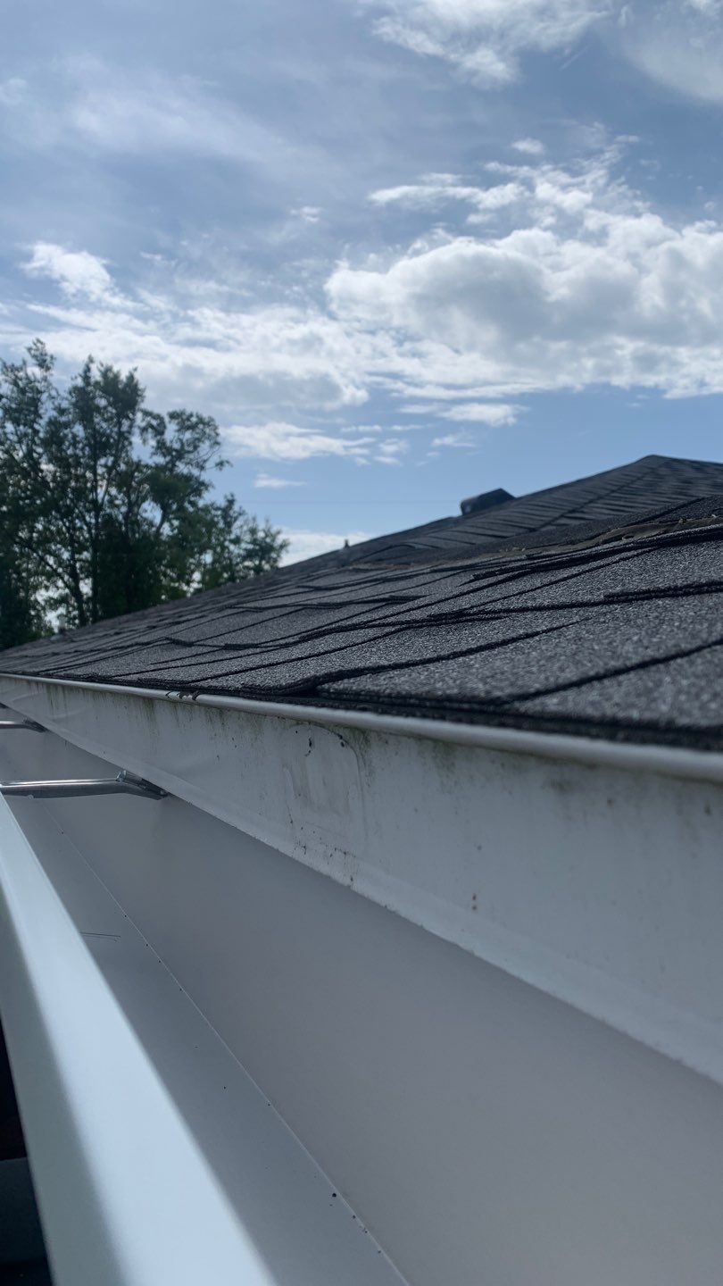 Seamless Gutter Installation Using 6-Inch White K-Style Seamless Gutters by Gutter Professors