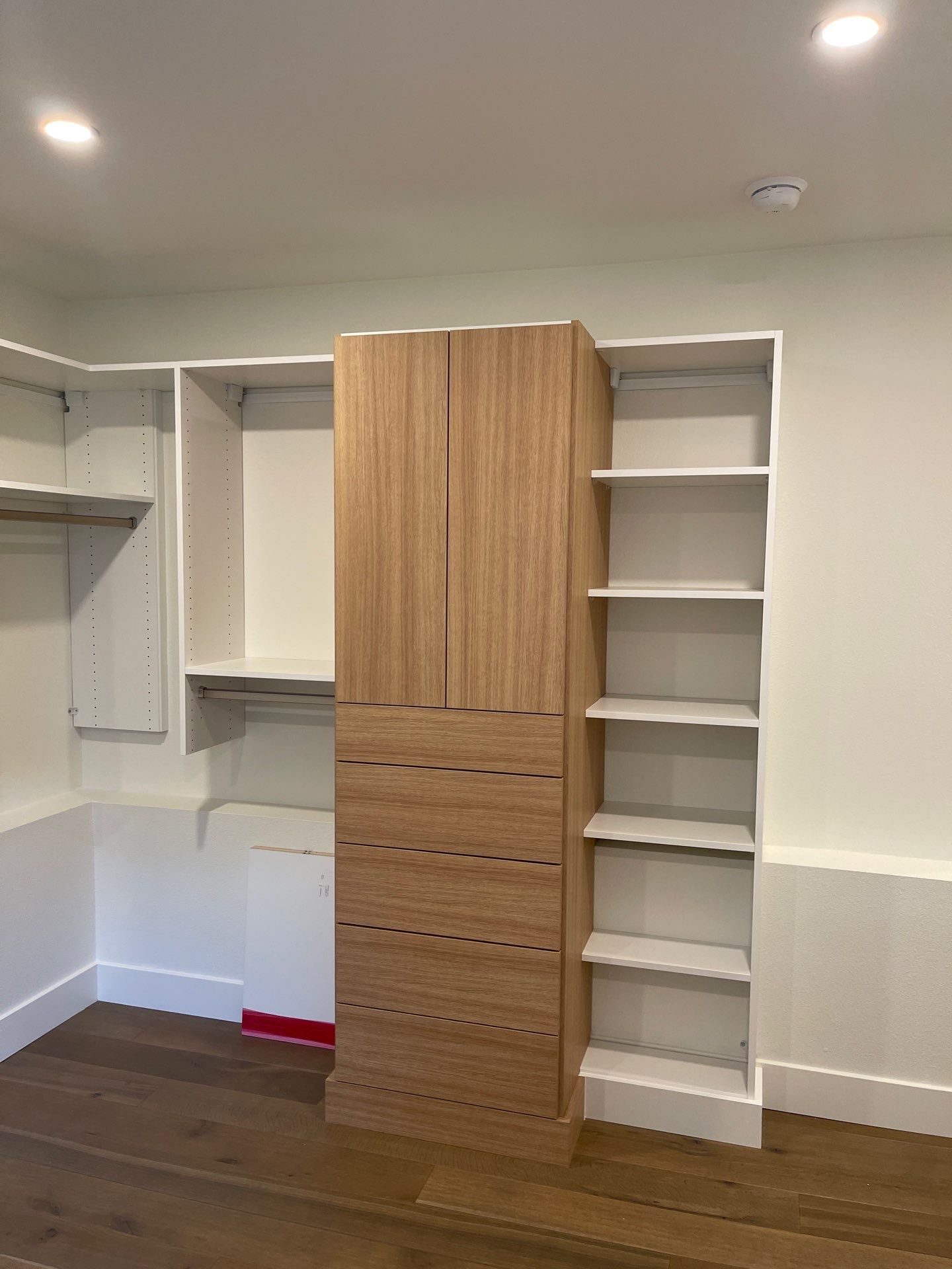 Two-Tone Walk-In Closet in Boulder by Concept 32, Inc.