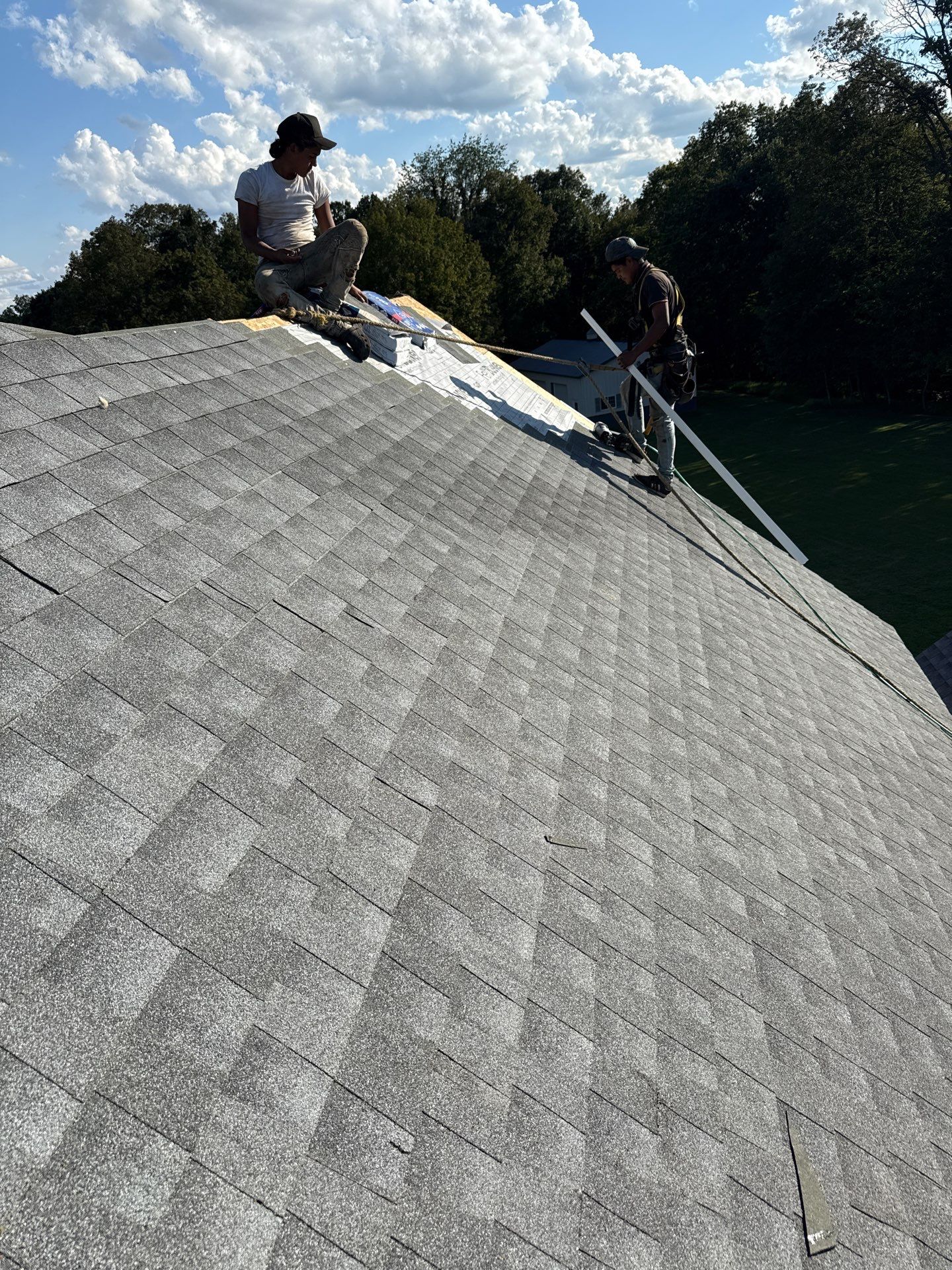 Residential Roofing Installation using GAF Timberline HDZ Oyster Grey by Rainstoppers Roofing