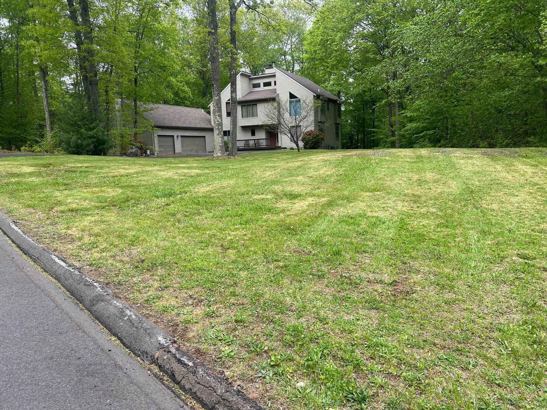 Seasonal Property Cleanup and Professional Mowing in Hamden by Diamond Image LLC