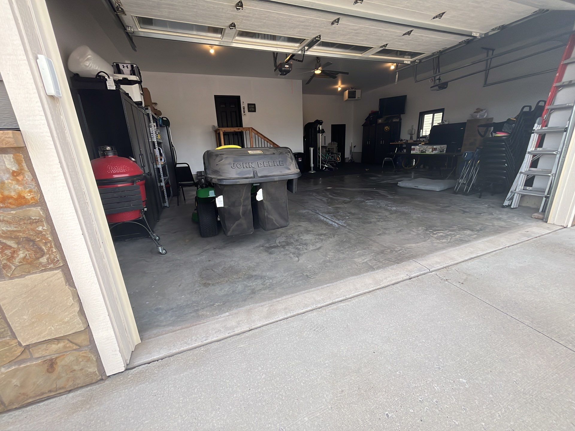 Domino Flake Garage Floor Epoxy Coating in Brandon by Select Painting, Coatings & Garage Cabinets