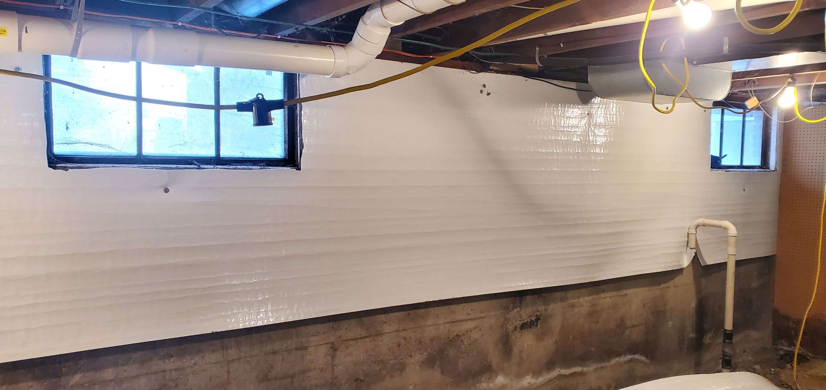 Interior Basement Waterproofing System using GrateDrain Waterproofing System by Toledo Basement Repair 