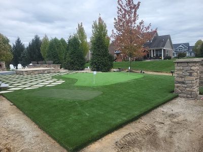 Residential Golf Green and Modern Paver Patio Installation in Centerville