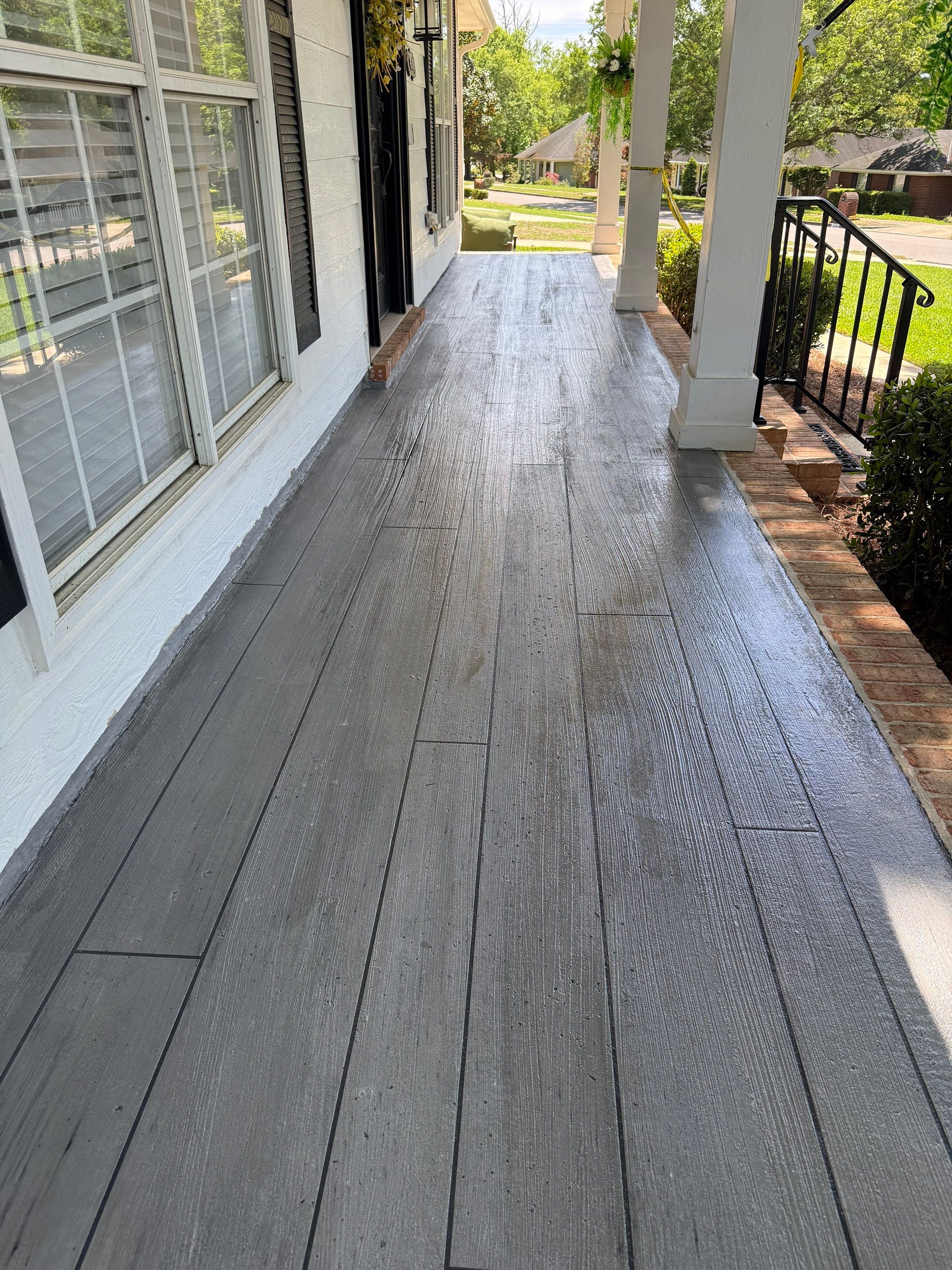 Wood-Grain Stenciled Concrete Porch Resurfacing in Mobile by Cornerstone Hard Surface Restoration 