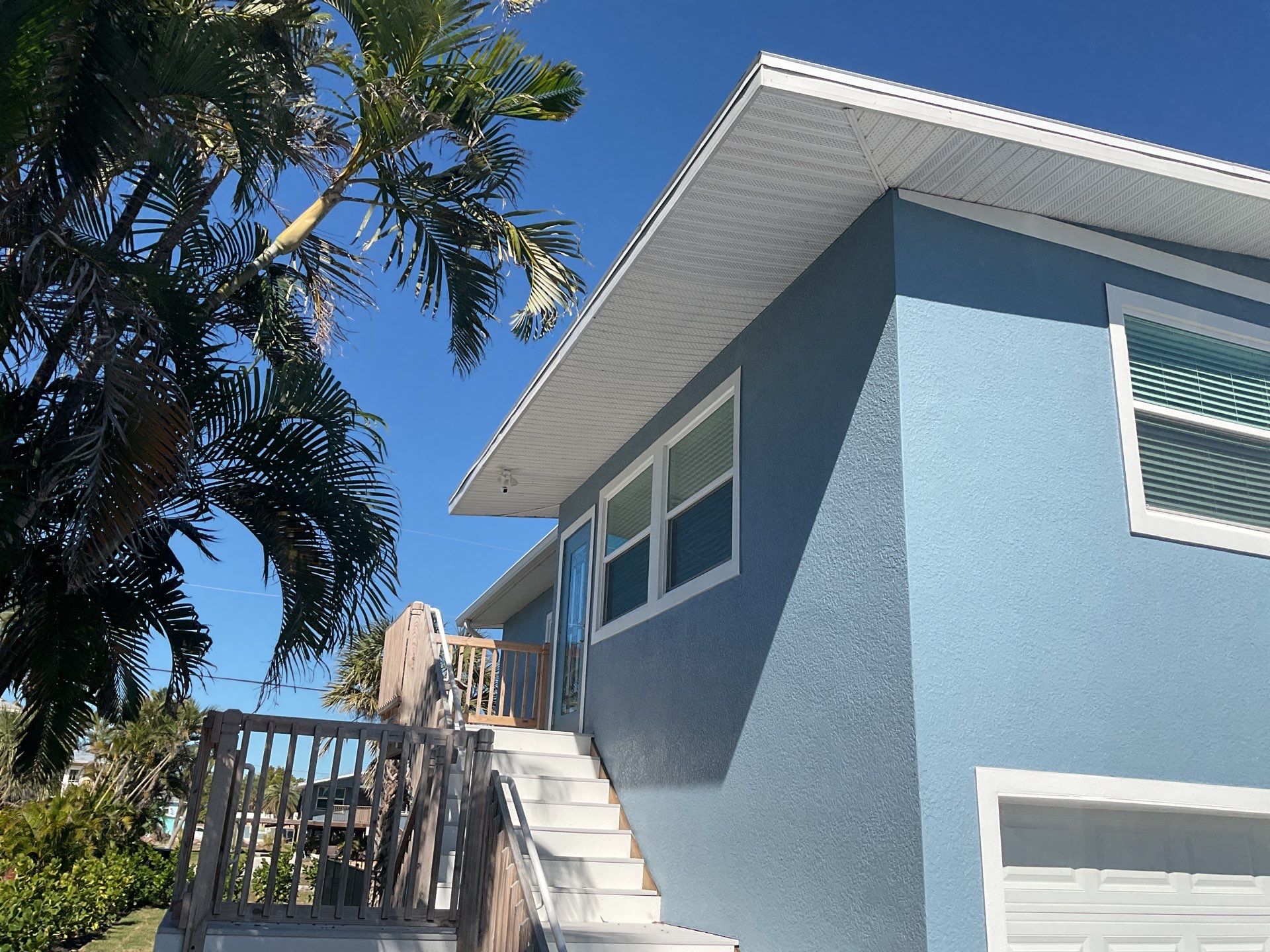 Downspout Installation for Two-Story Home in Fort Myers FL by Gutter Professor by Gutter Professors
