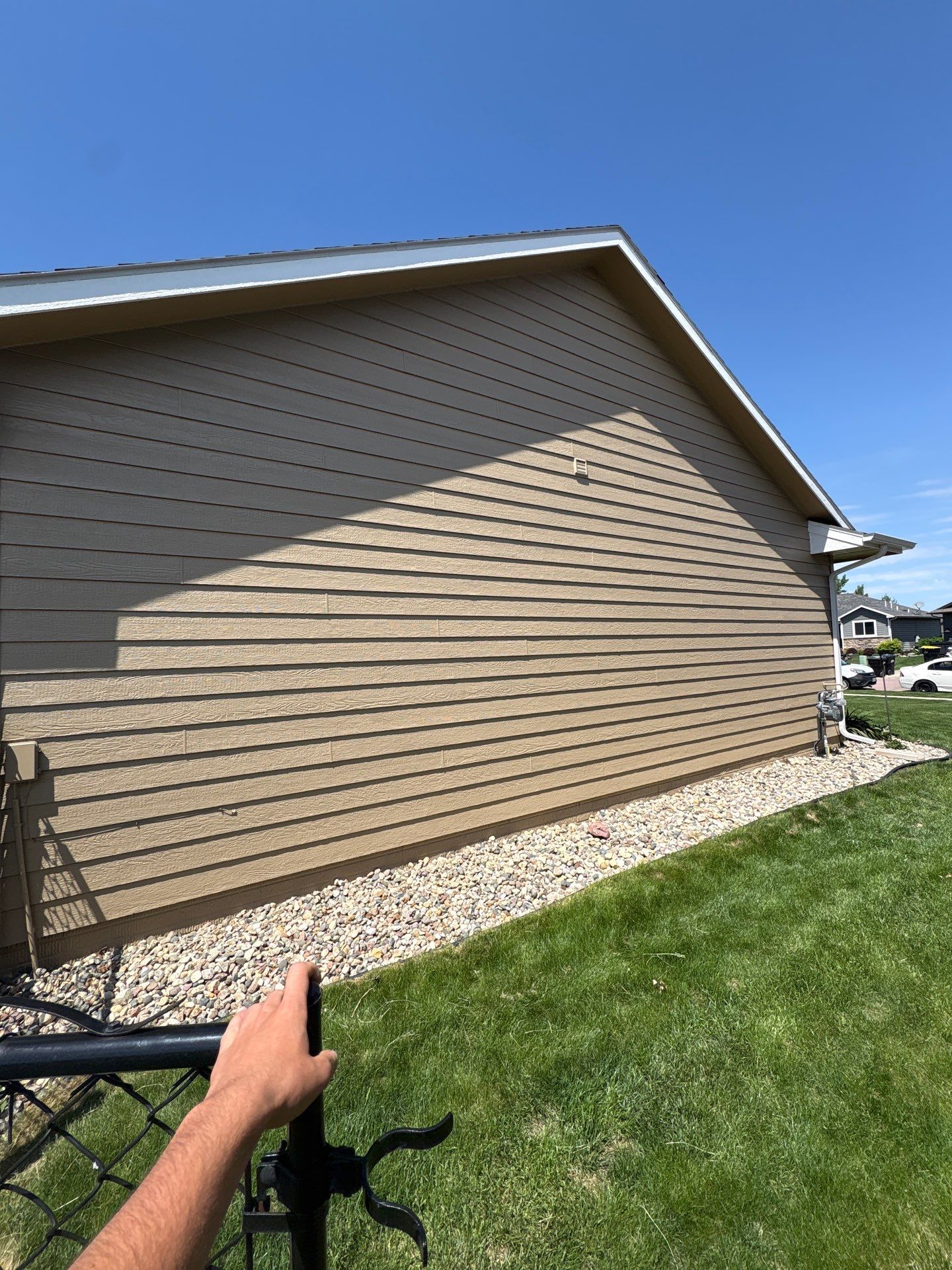 Residential Exterior Painting and Siding Refresh in Sioux Falls by Select Painting, Coatings & Garage Cabinets