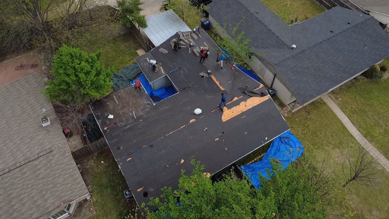 Full Roof Replacement & Flat Roof System in Garland by road roofing llc