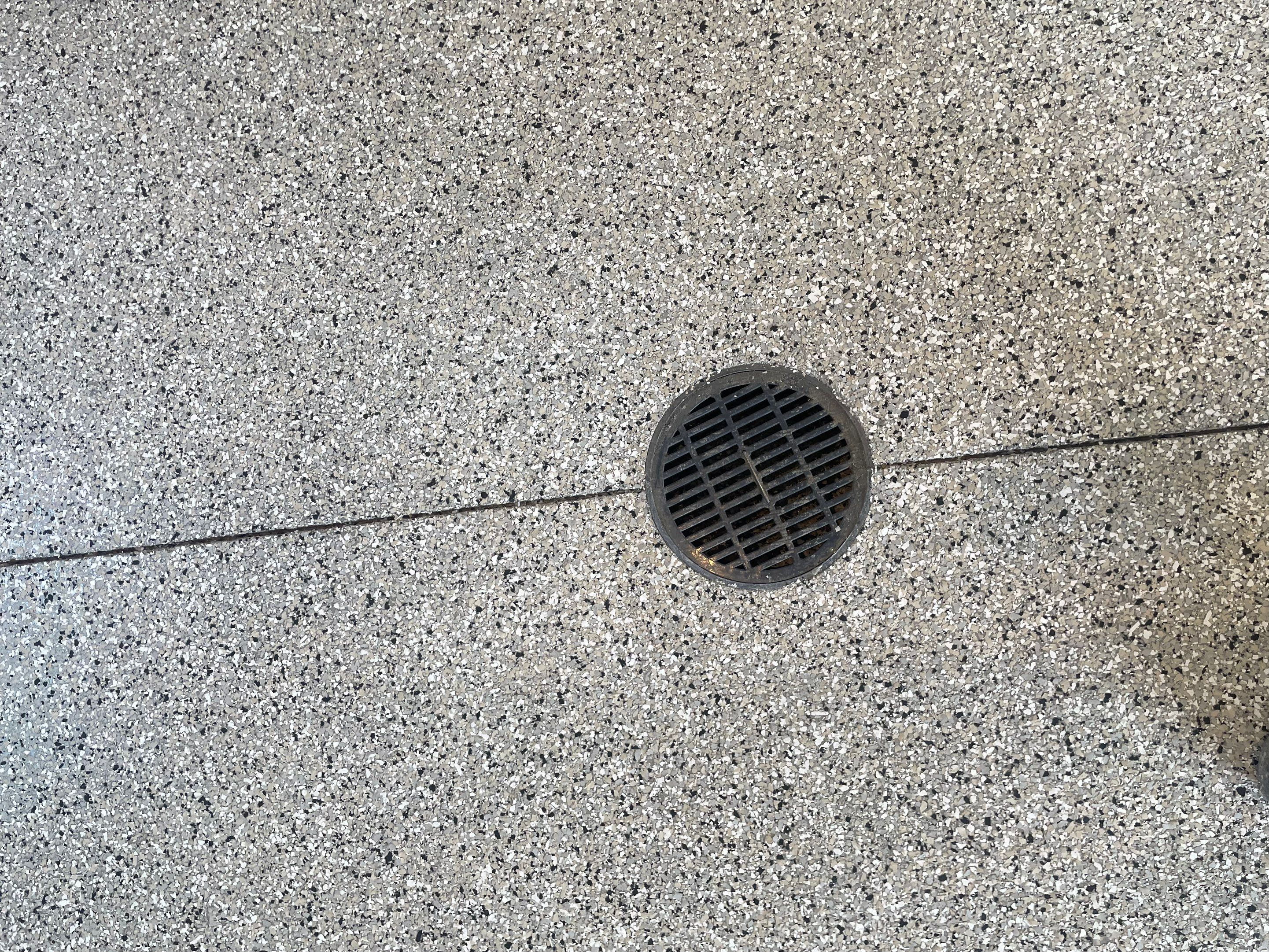 Custom Speckled Concrete Coating for Dell Rapids Garage by Select Painting, Coatings & Garage Cabinets