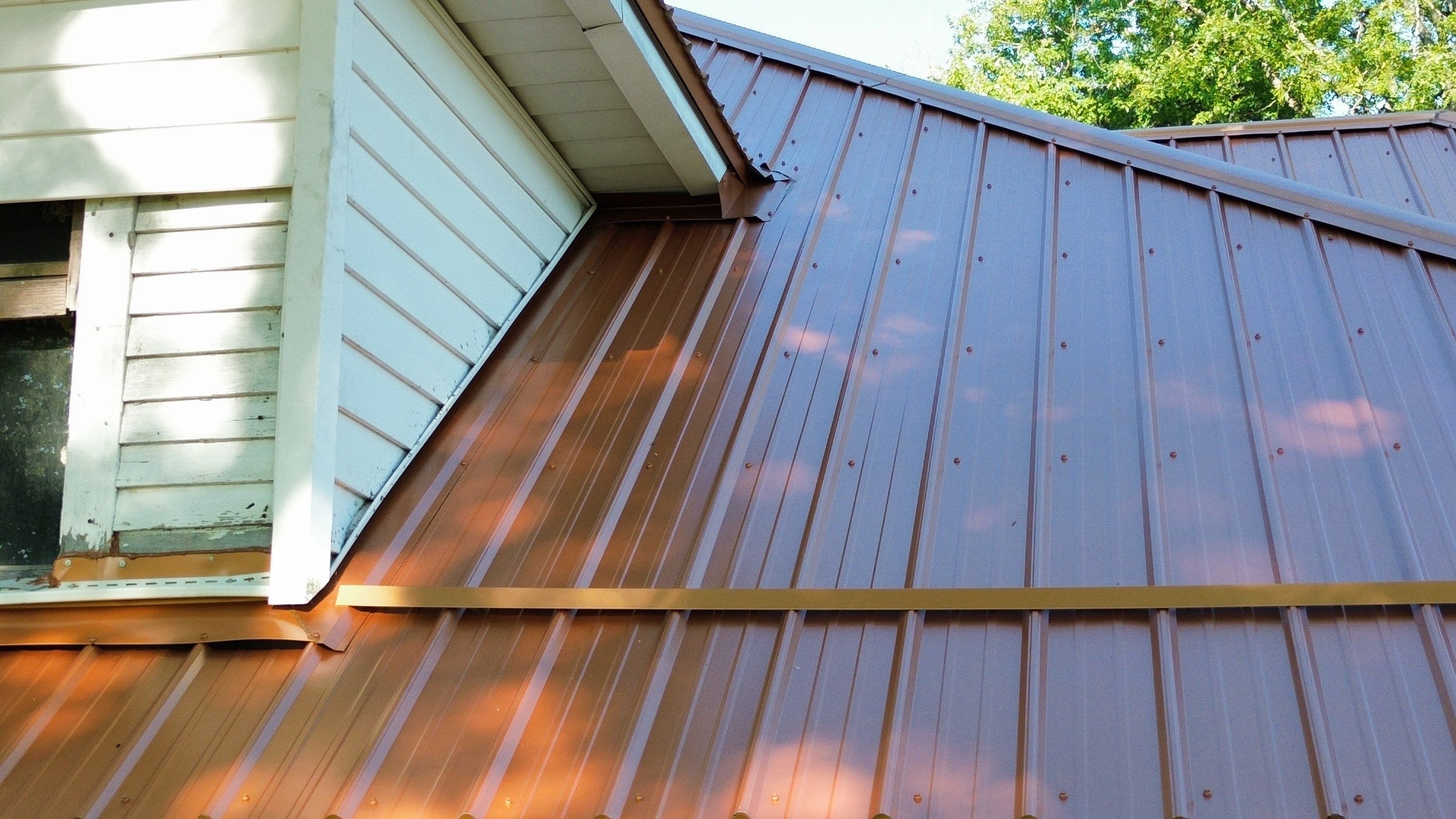 Residential Roofing Installation using Performance Panel Metal - Copper Metallic by RoofX 