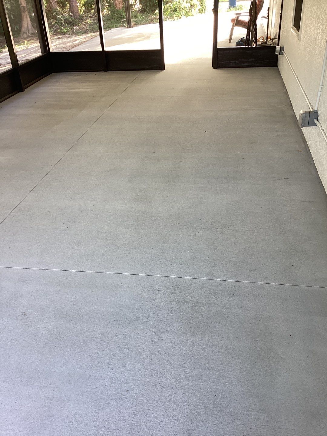 Patio using Pebble Beach by Amvet concrete coatings llc