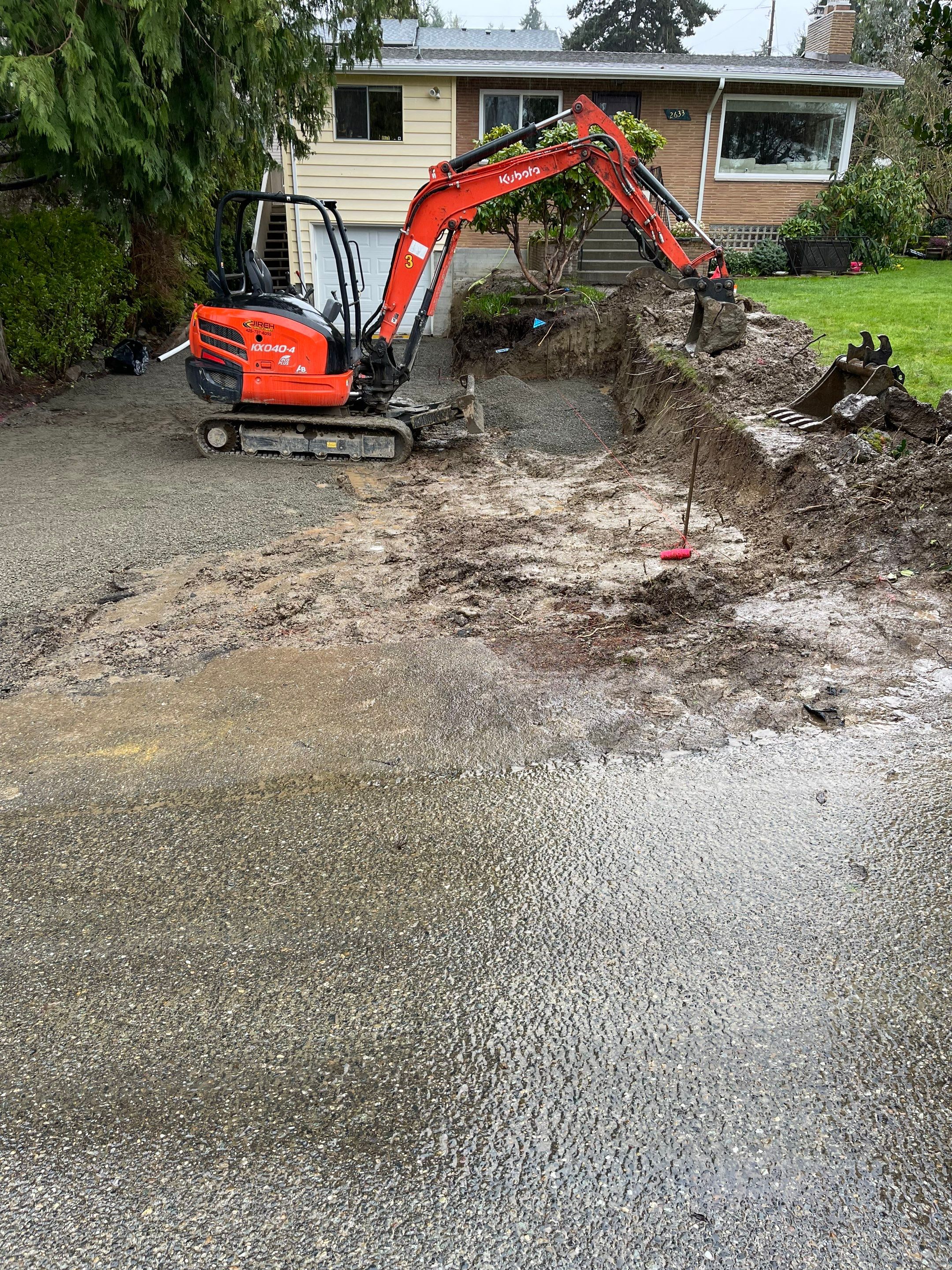 Lorra | Asphalt Driveway Repair & Retaining Wall by Jireh Asphalt & Concrete Inc 