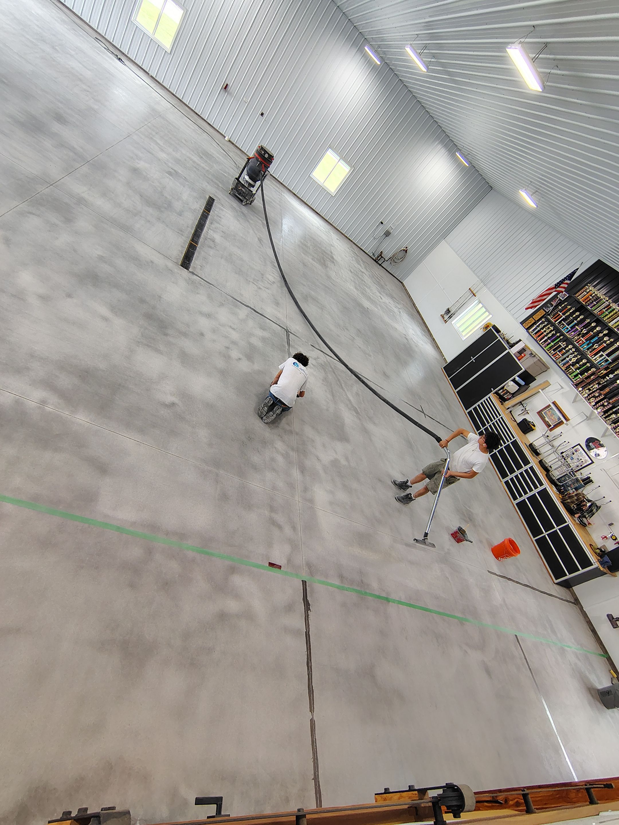 Multi-Stage Concrete Floor Coating for Egan Shop and RV Storage by Select Painting, Coatings & Garage Cabinets