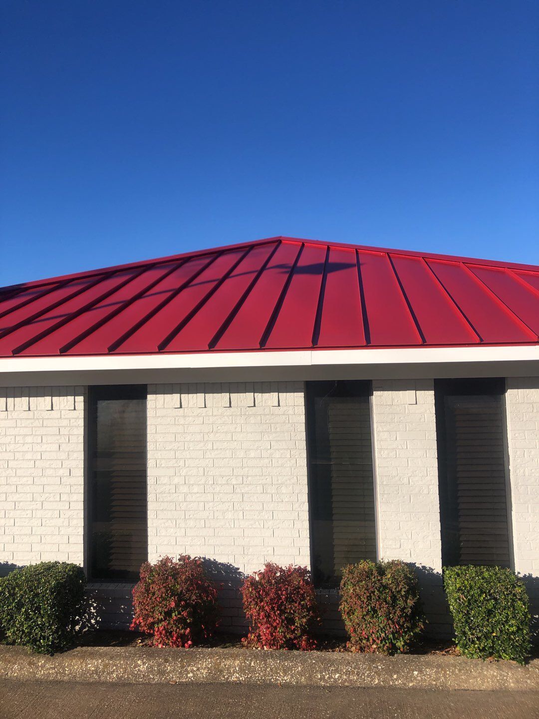 Commercial metal roof by Springtree Restoration 