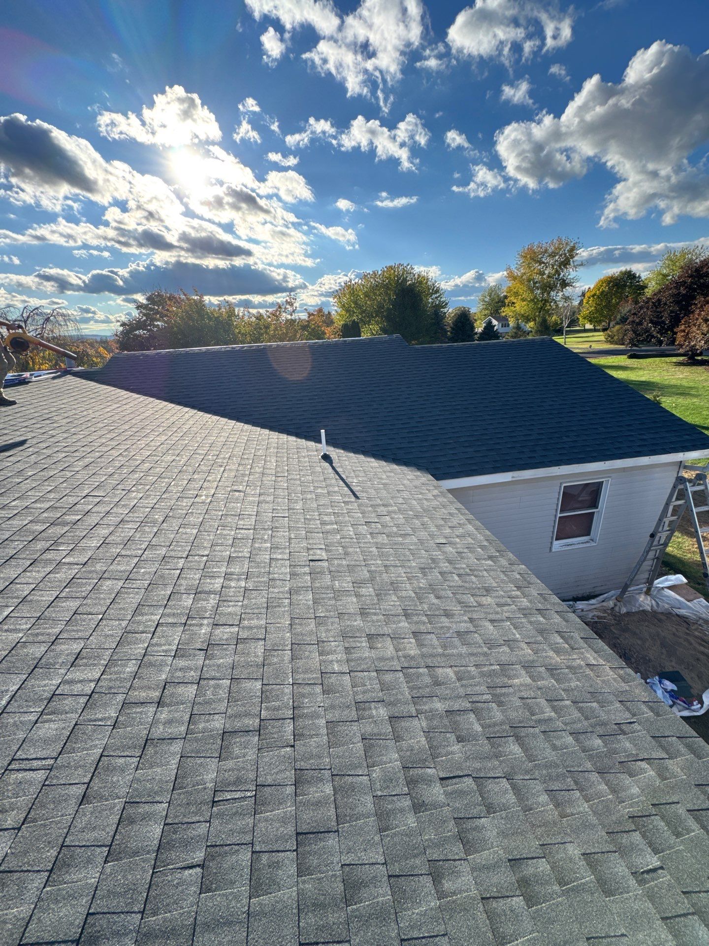Residential Addition and Covered Porch Roof  by Esh Builders