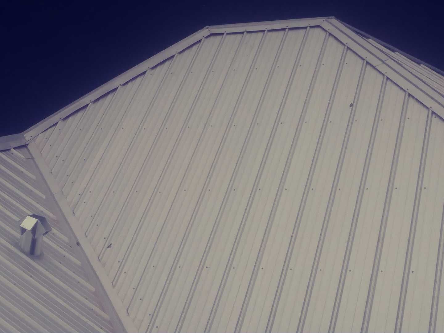 Residential Roofing Installation using Metal roofing by American Roofing & Construction LLC