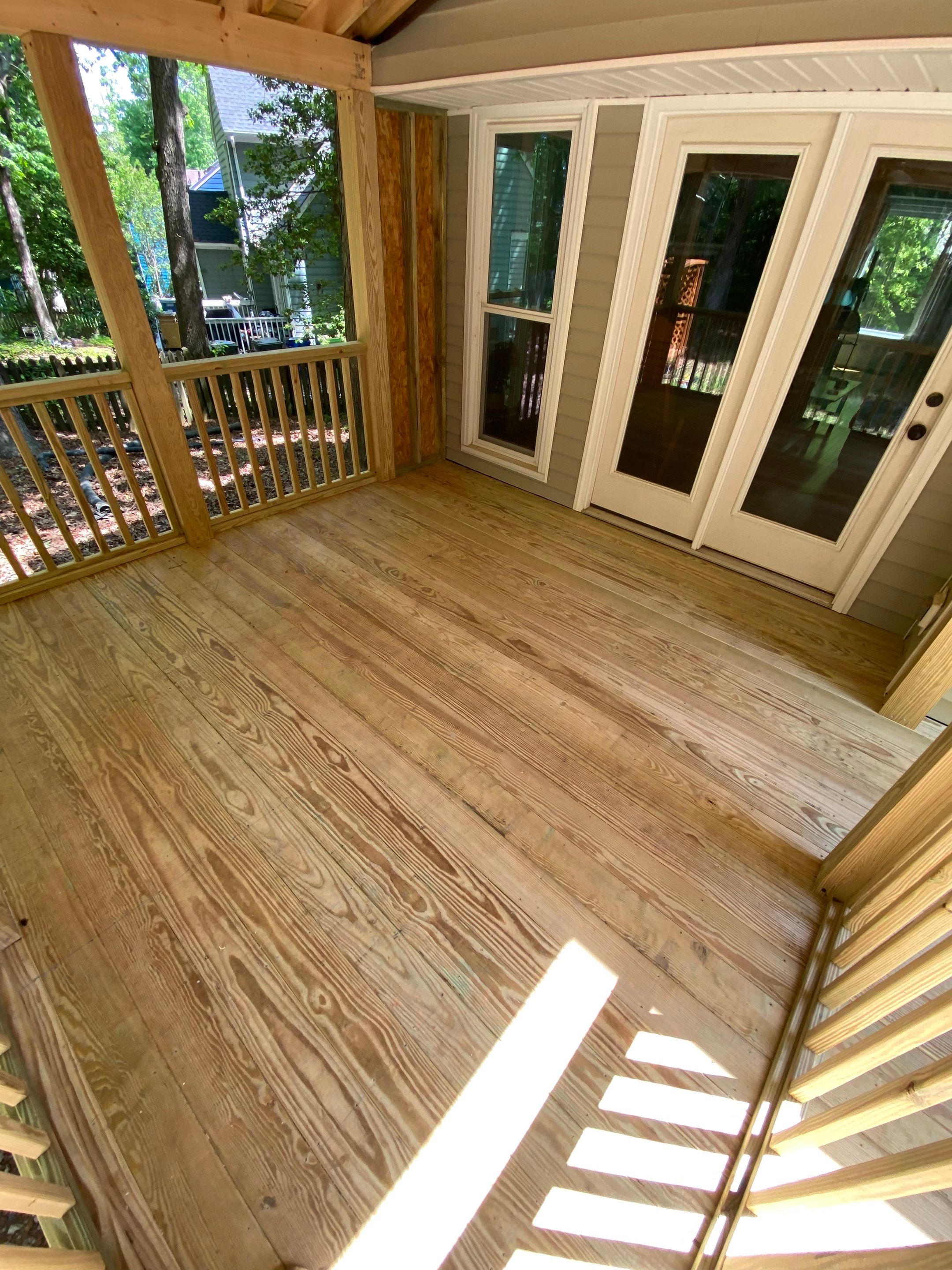 Custom Screen Porch Addition with Gabled Roof and Open Deck by The Remodeling Company