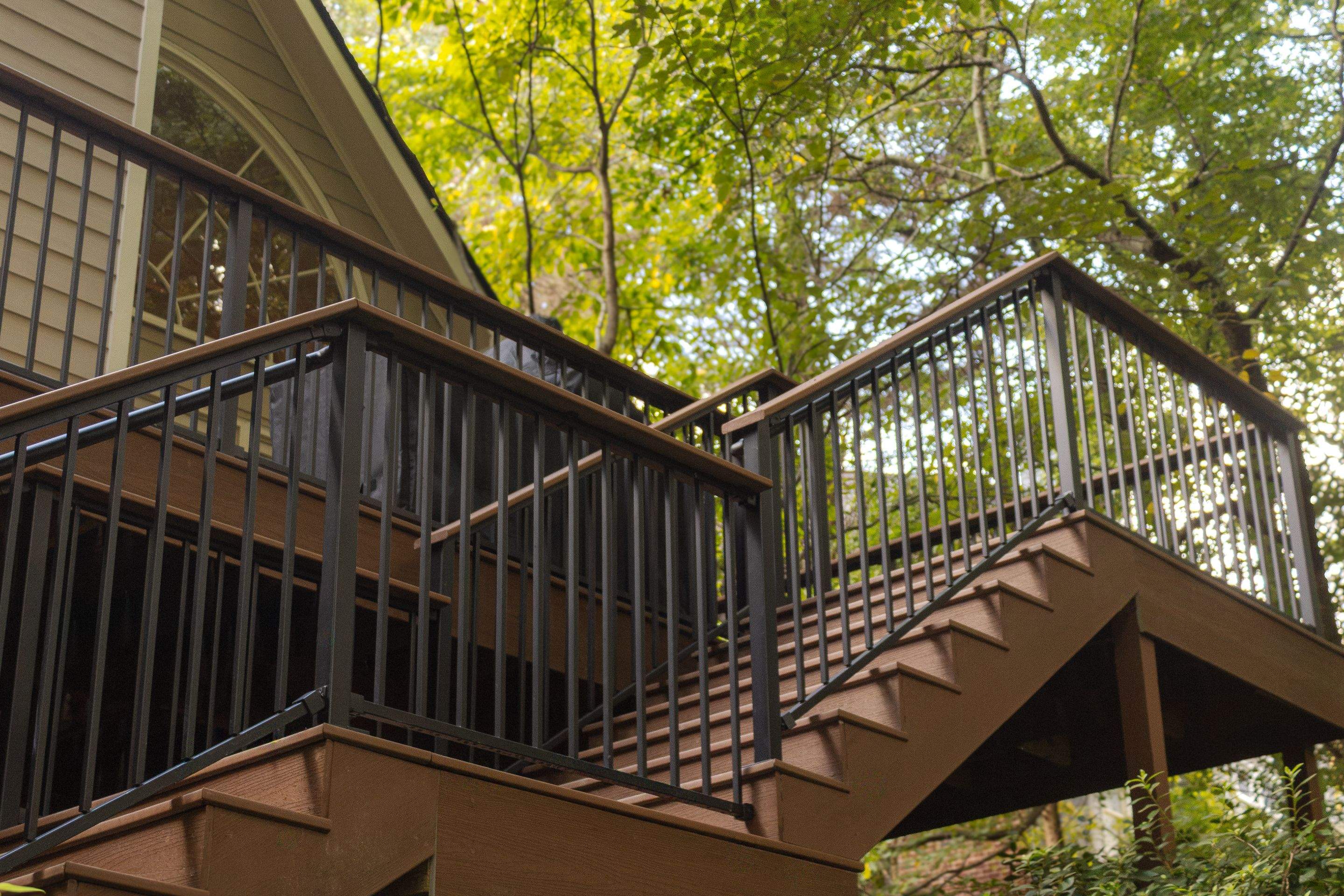 Full James Hardie Siding Replacement and Trex Deck Resurface in the Saddle Color by Nelson Exteriors 