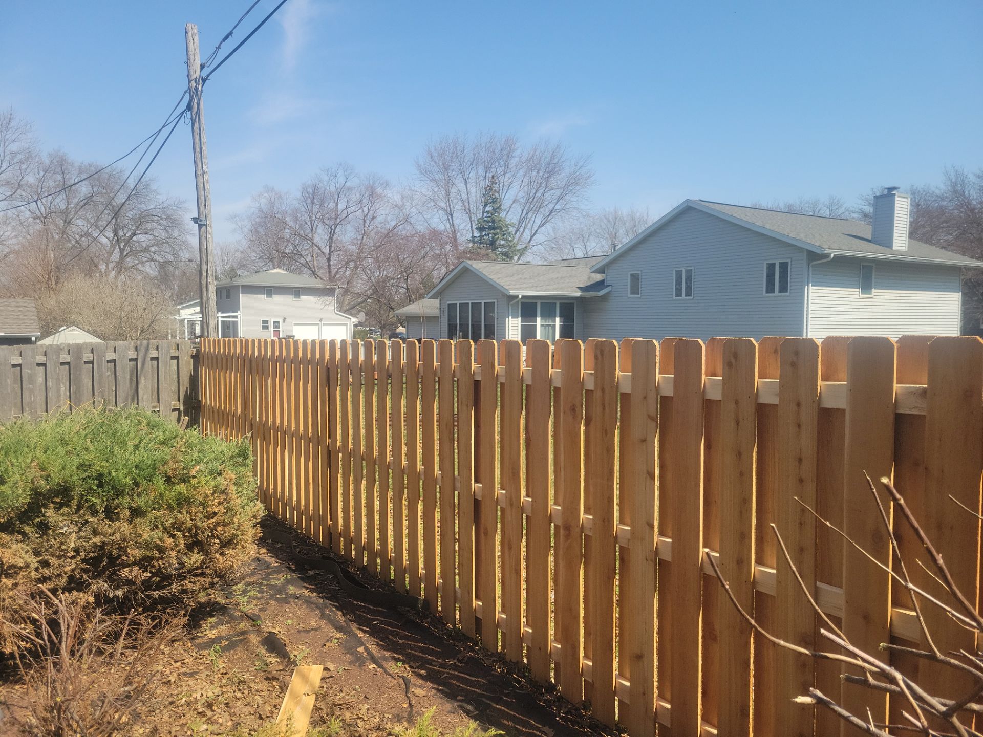 Cedar Shadowbox Wood Privacy Fence Installation in Cedar Falls by Perfect Picket Fence and Stain