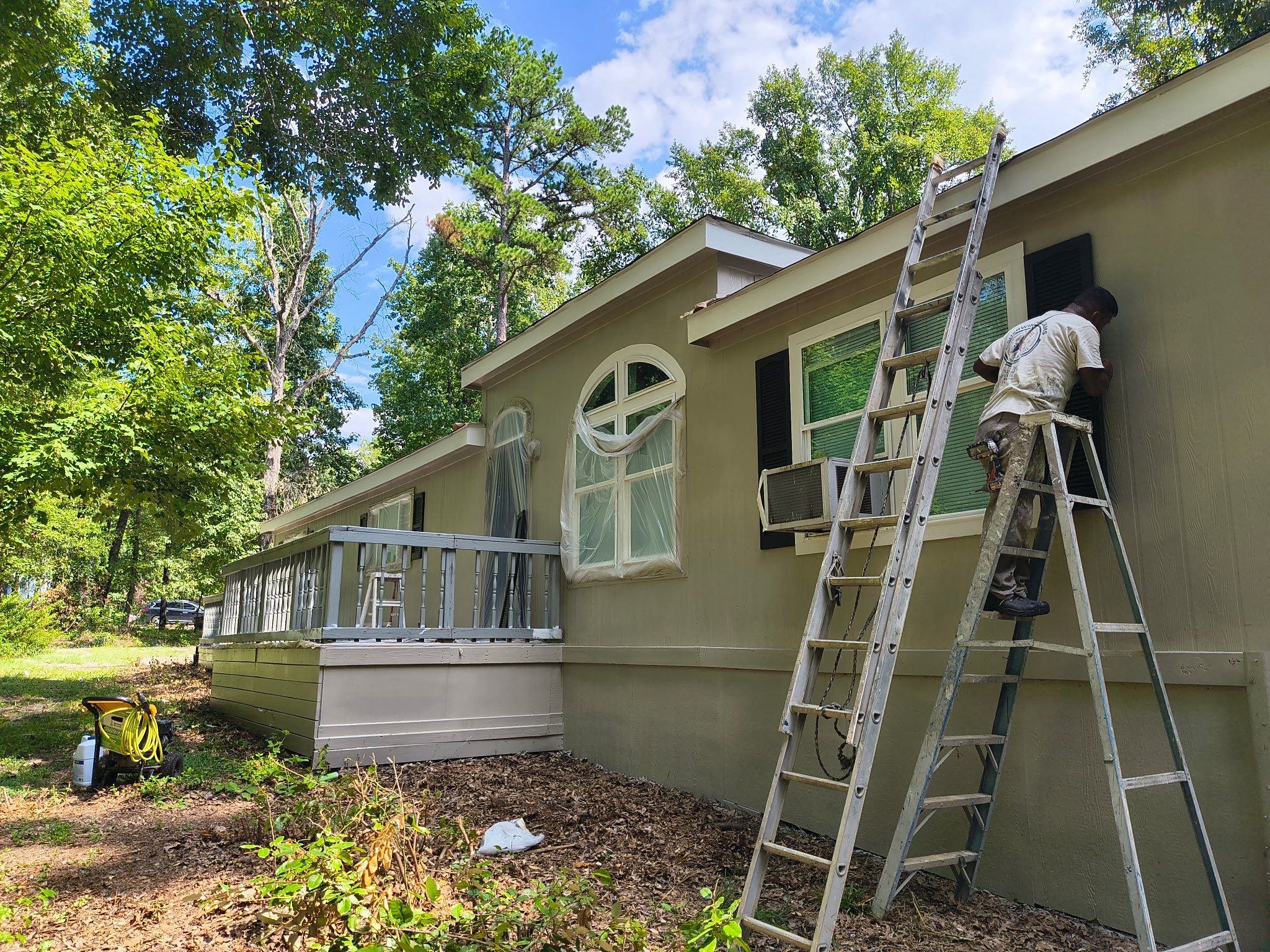 Exterior Painting in Tyler, TX | Black Back Porch, Wood & Shutters by Quality Coats Painting