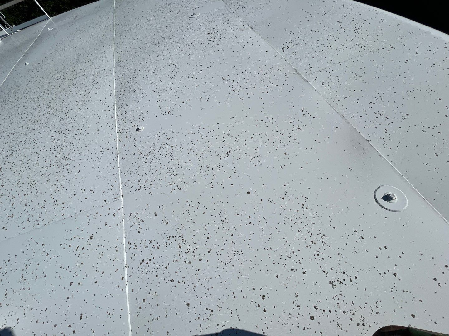 Water tank cleaning by Northern Power Washing LLC.