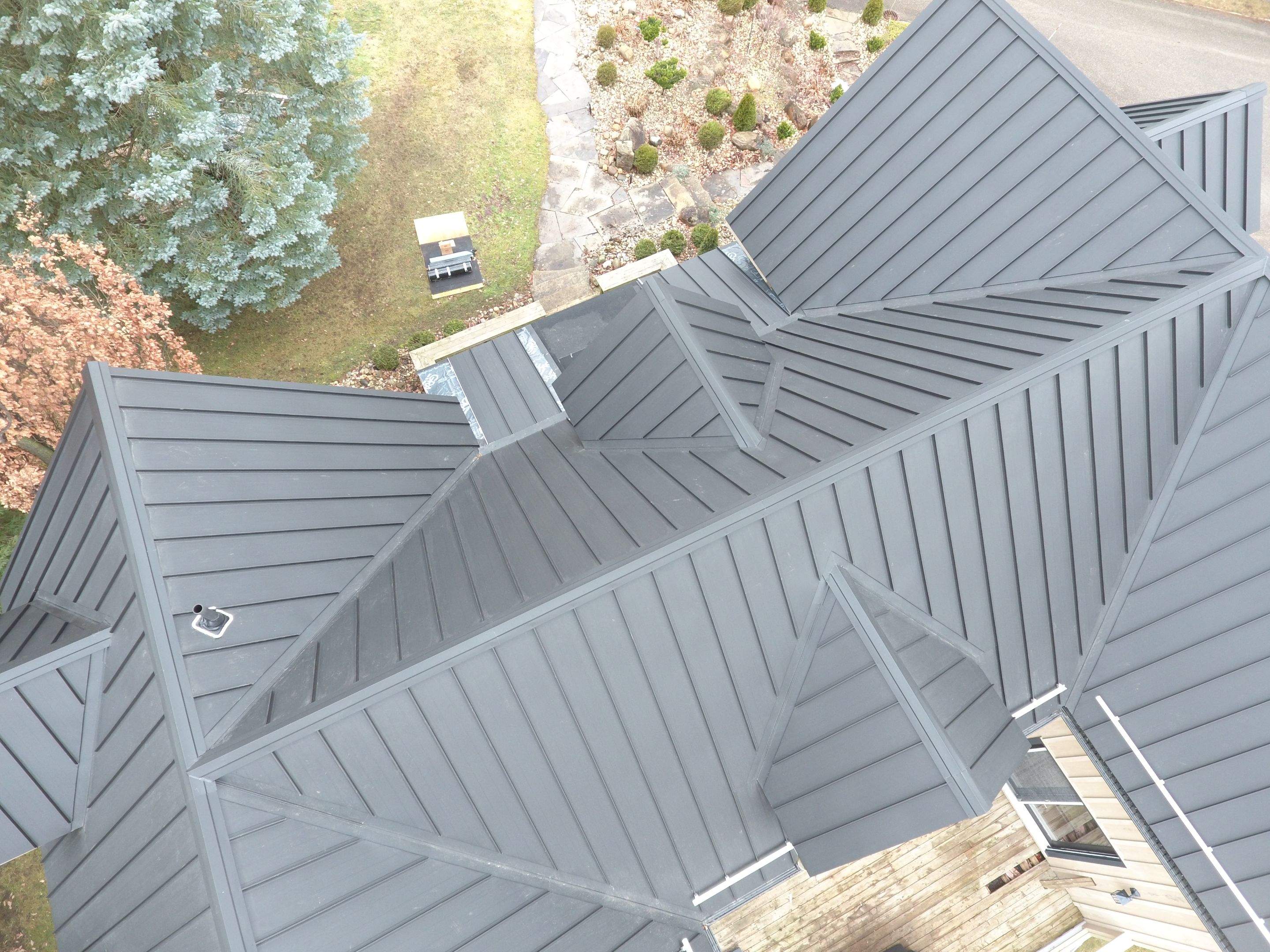 Residential Roofing Installation using 24 Ga Standing Seam Metal by Jay Carter Roofing & Sheet Metal