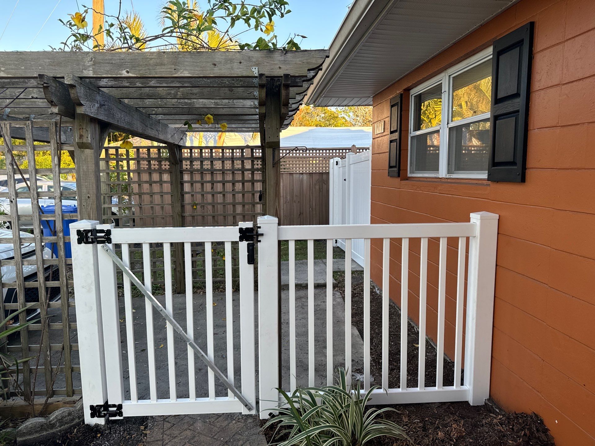 Vinyl Fence Installation using 6Ft White Vinyl Privacy Fence and a 4Ft White Vinyl Picket Fence by Asap fence and gates, LLC