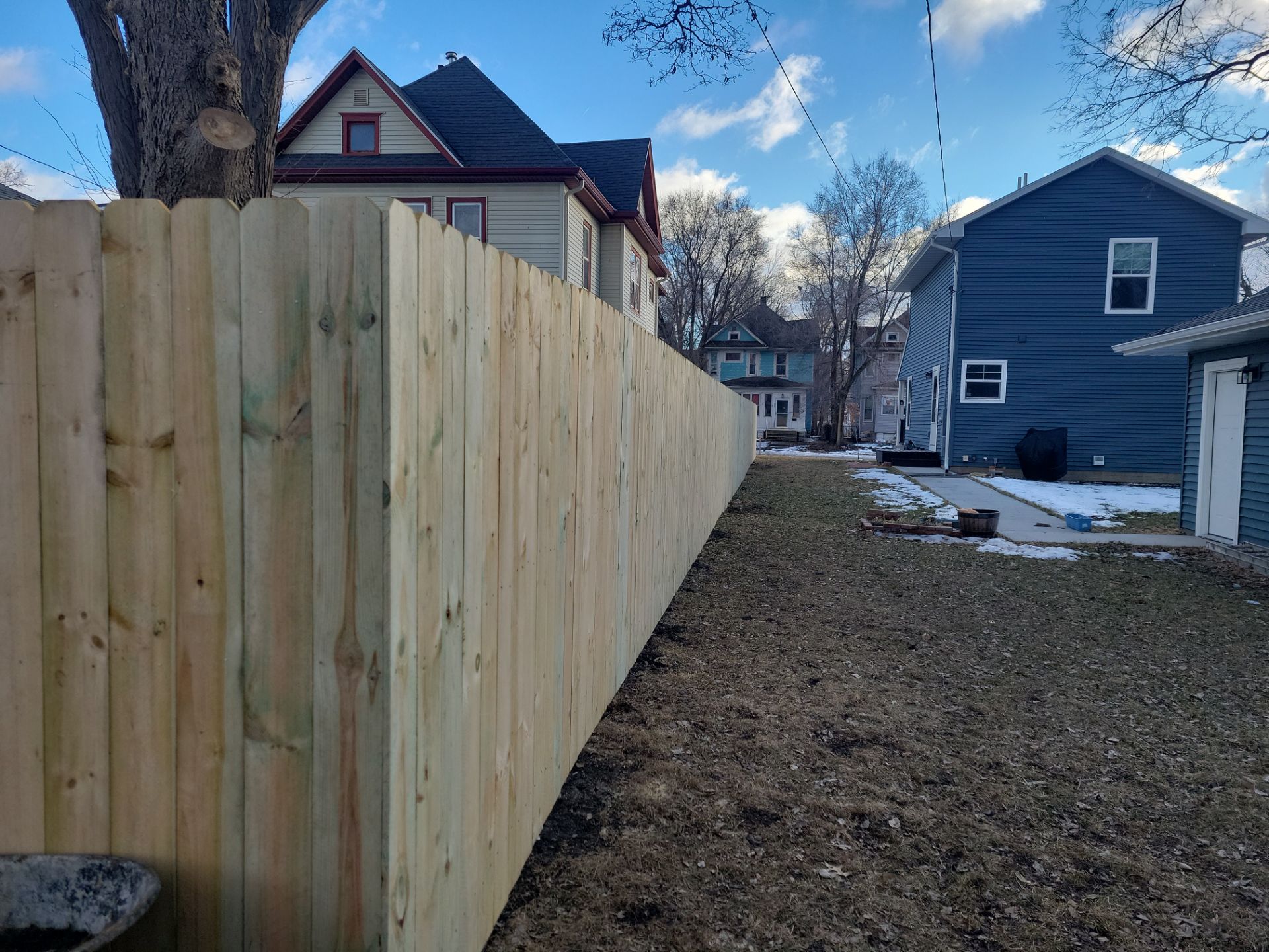 Pressure-Treated Wood Privacy Fence and Double Gate Installation in Waterloo by Perfect Picket Fence and Stain