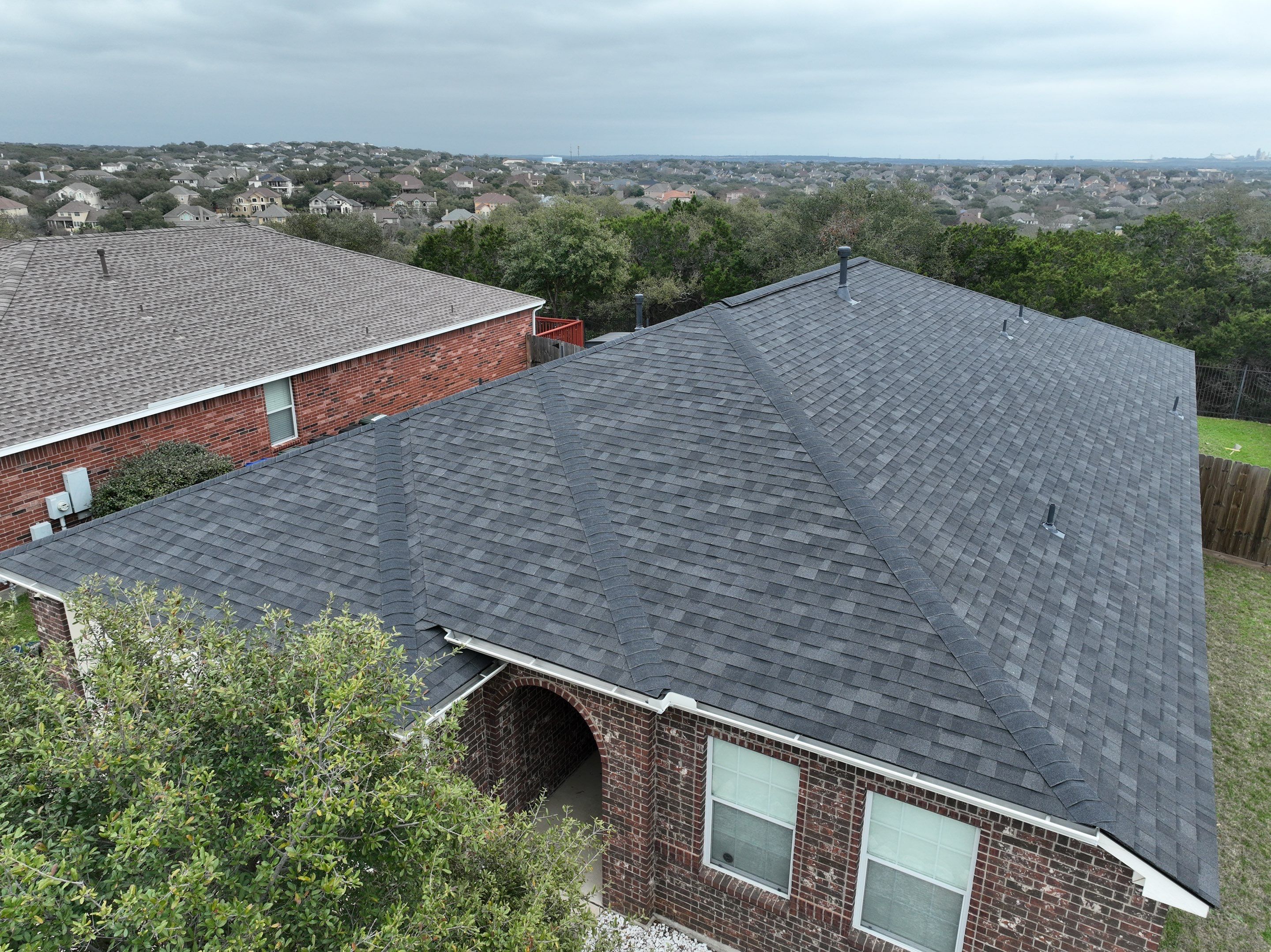 Residential Roof Replacement using 30 Year Laminate Shingles with High Profile Ridge by Premier Roofing and Contracting