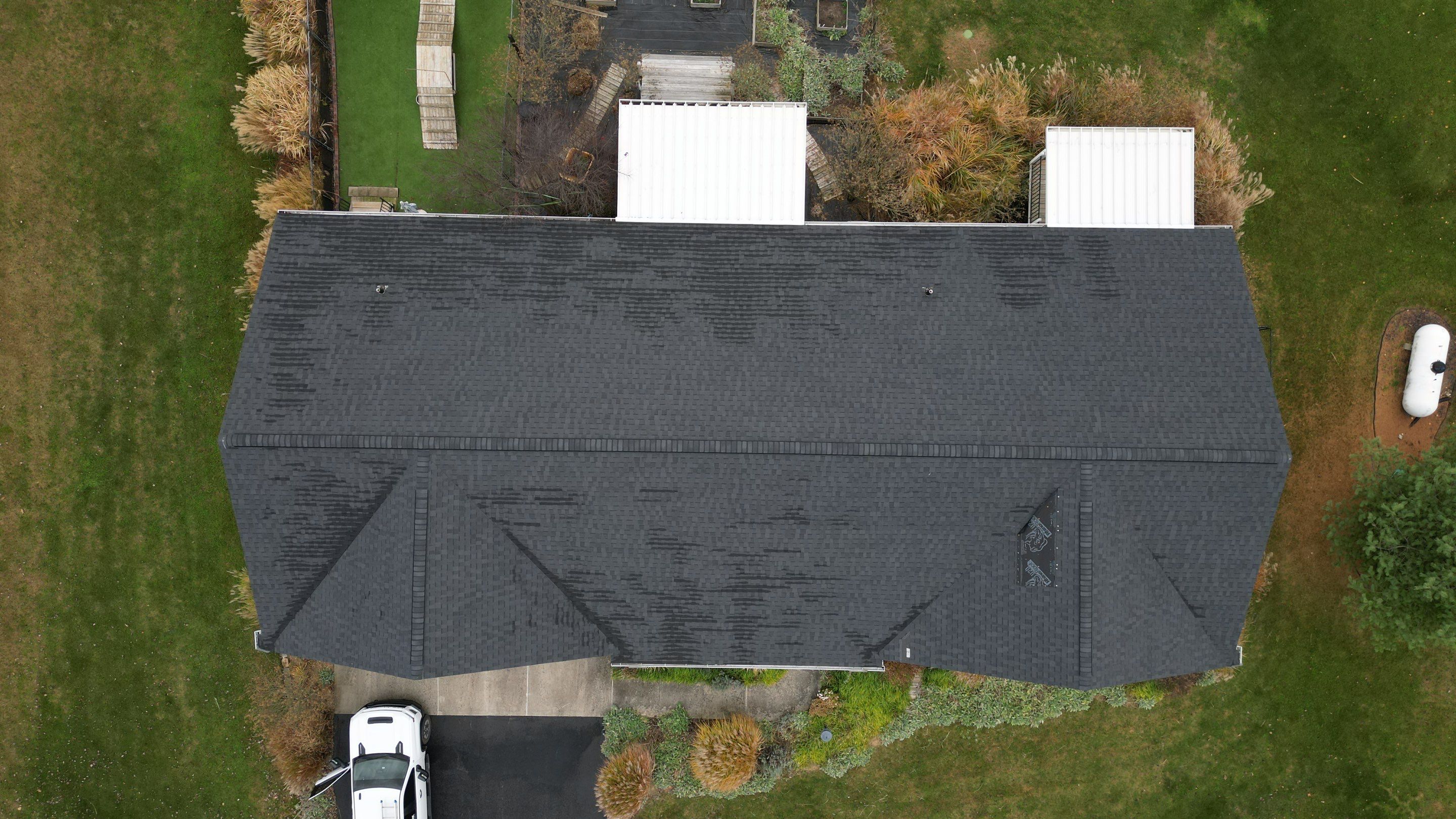 Residential Roofing Installation using Performance Panel Metal - Frost Black by RoofX 