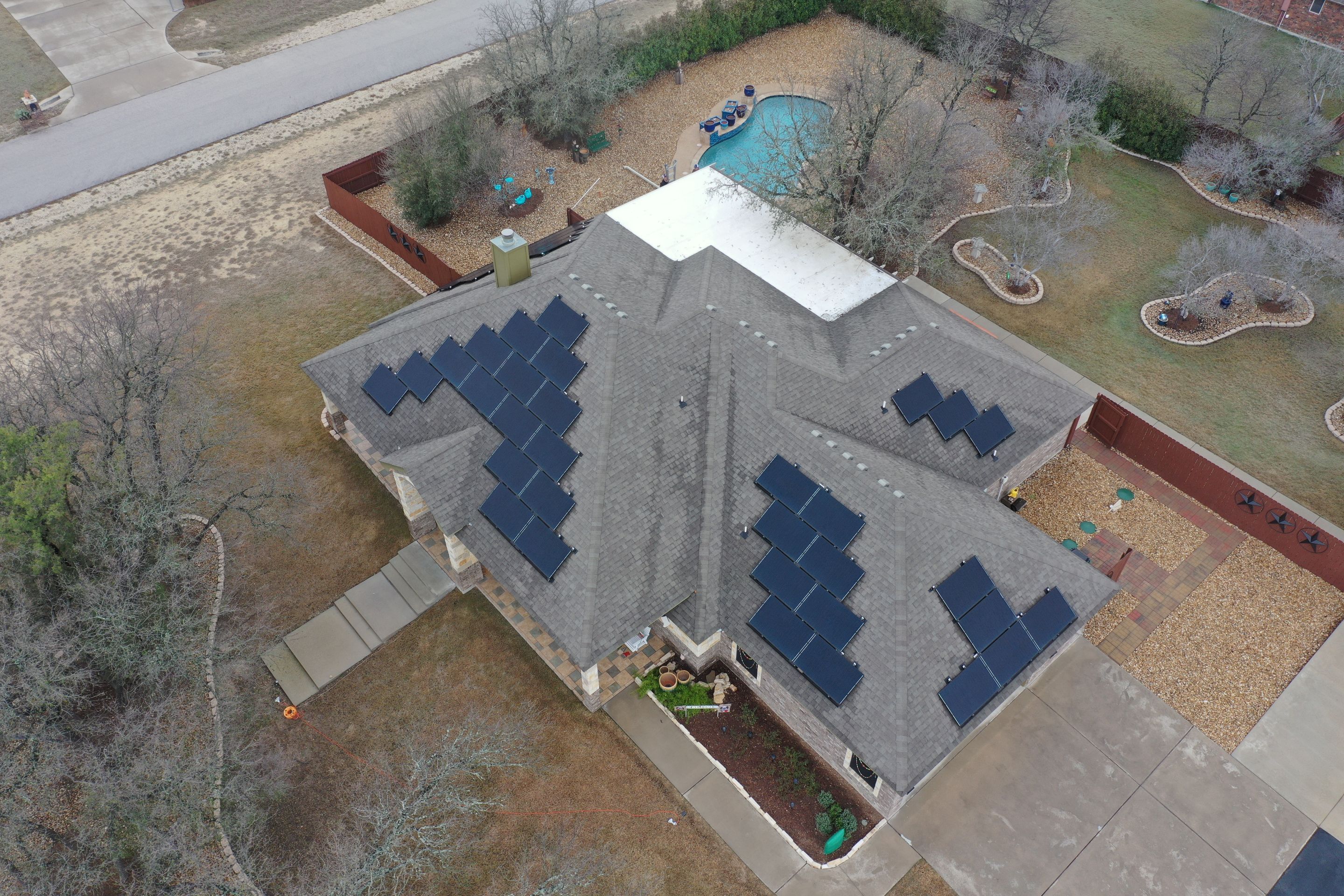 Residential Roof Replacement with Owens Corning - Duration - Sedona Canyon by Action Exteriors Austin