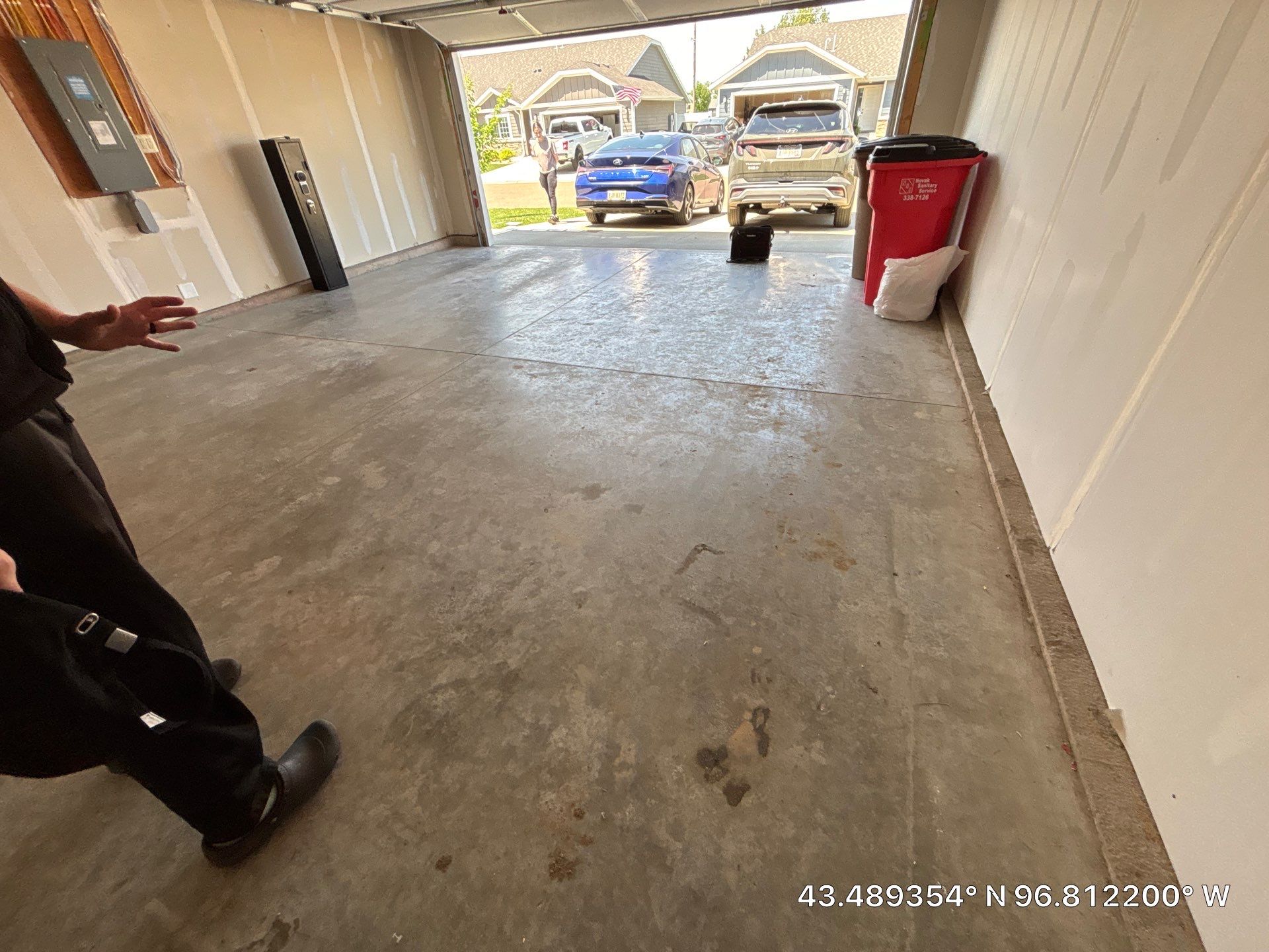 Custom Epoxy Garage Floor and Patio Coating in Sioux Falls by Select Painting, Coatings & Garage Cabinets