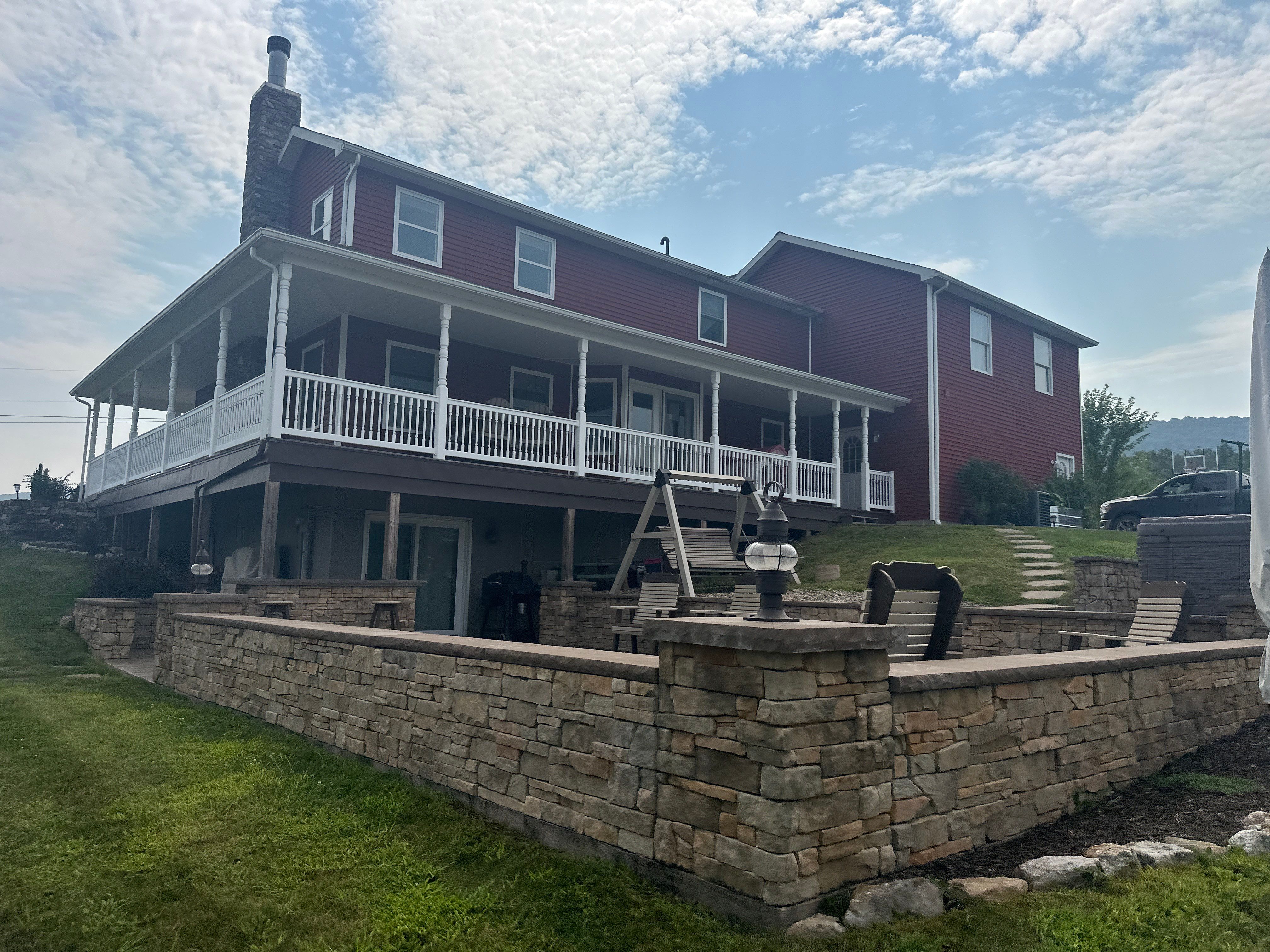 Covered Deck Addition With Custom Gable Roof in Tower City by Esh Builders
