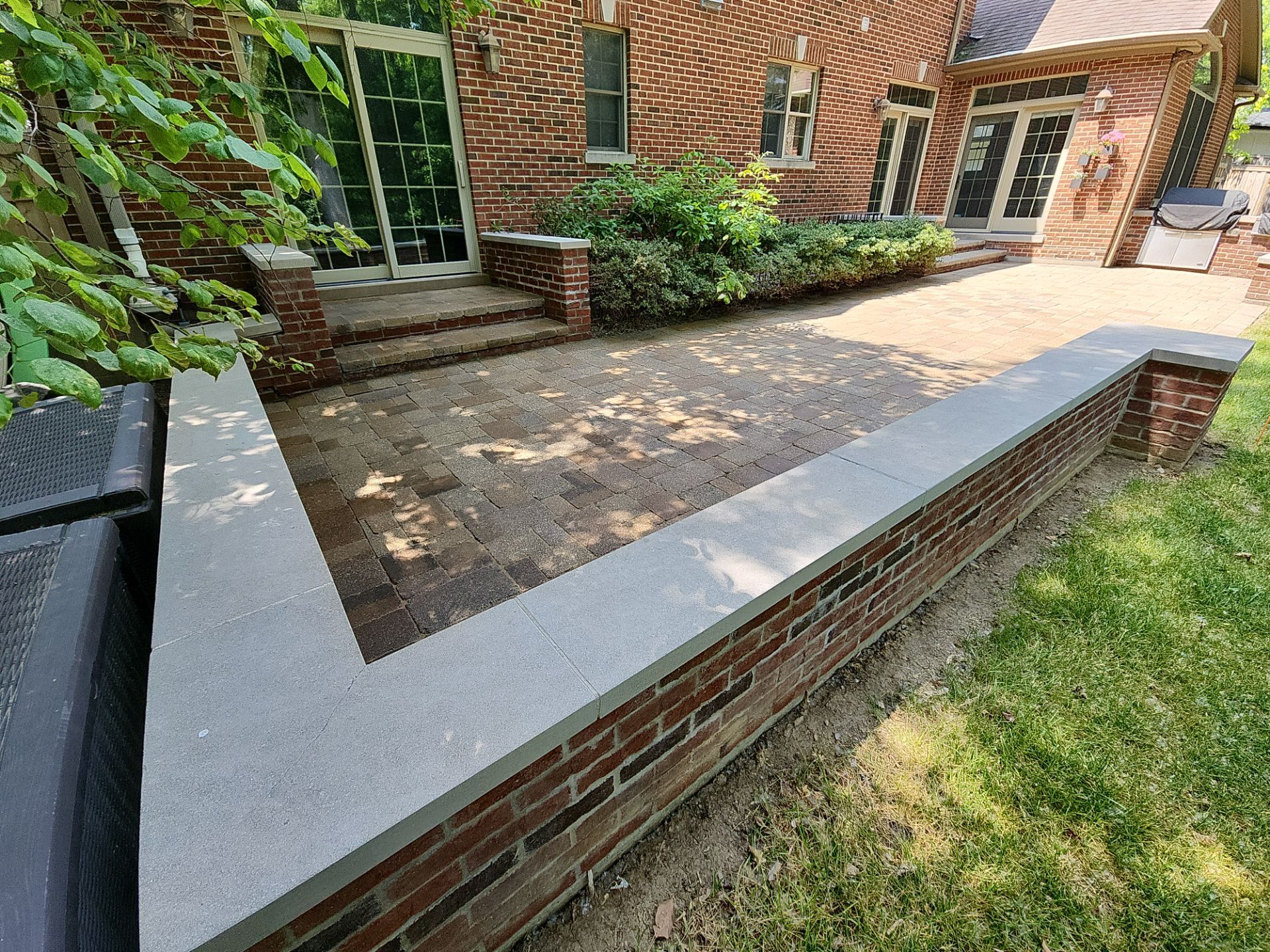 Brick paver repair, clean, seal and poly sanding by Northern Power Washing LLC.