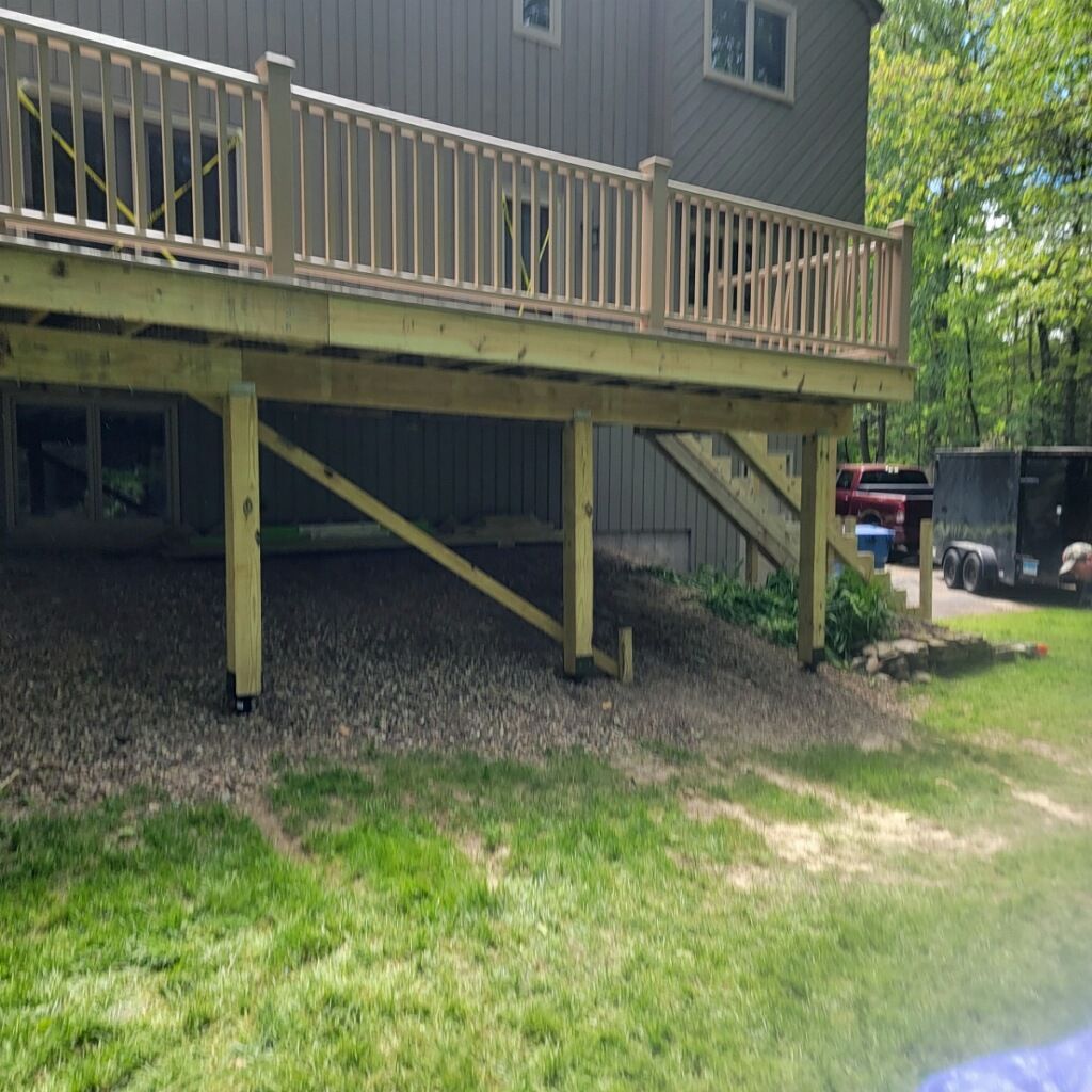 Deck Replacement using Trex Transcend Rope Swing and matching Transcend railings and trex fascia by DiGiorgi Roofing and Siding Inc