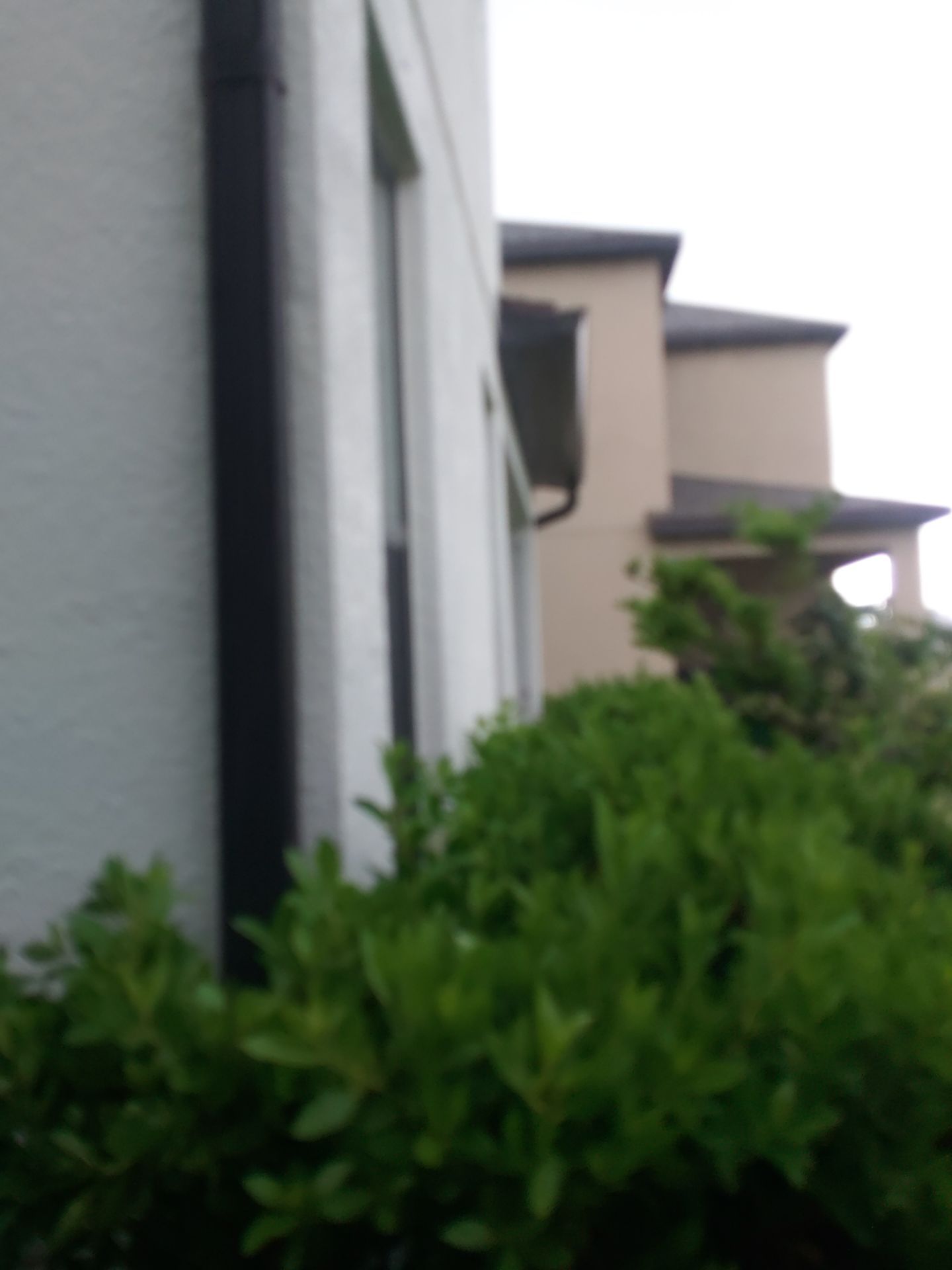 Bronze Seamless Gutters in Bradenton FL by Gutter Professors