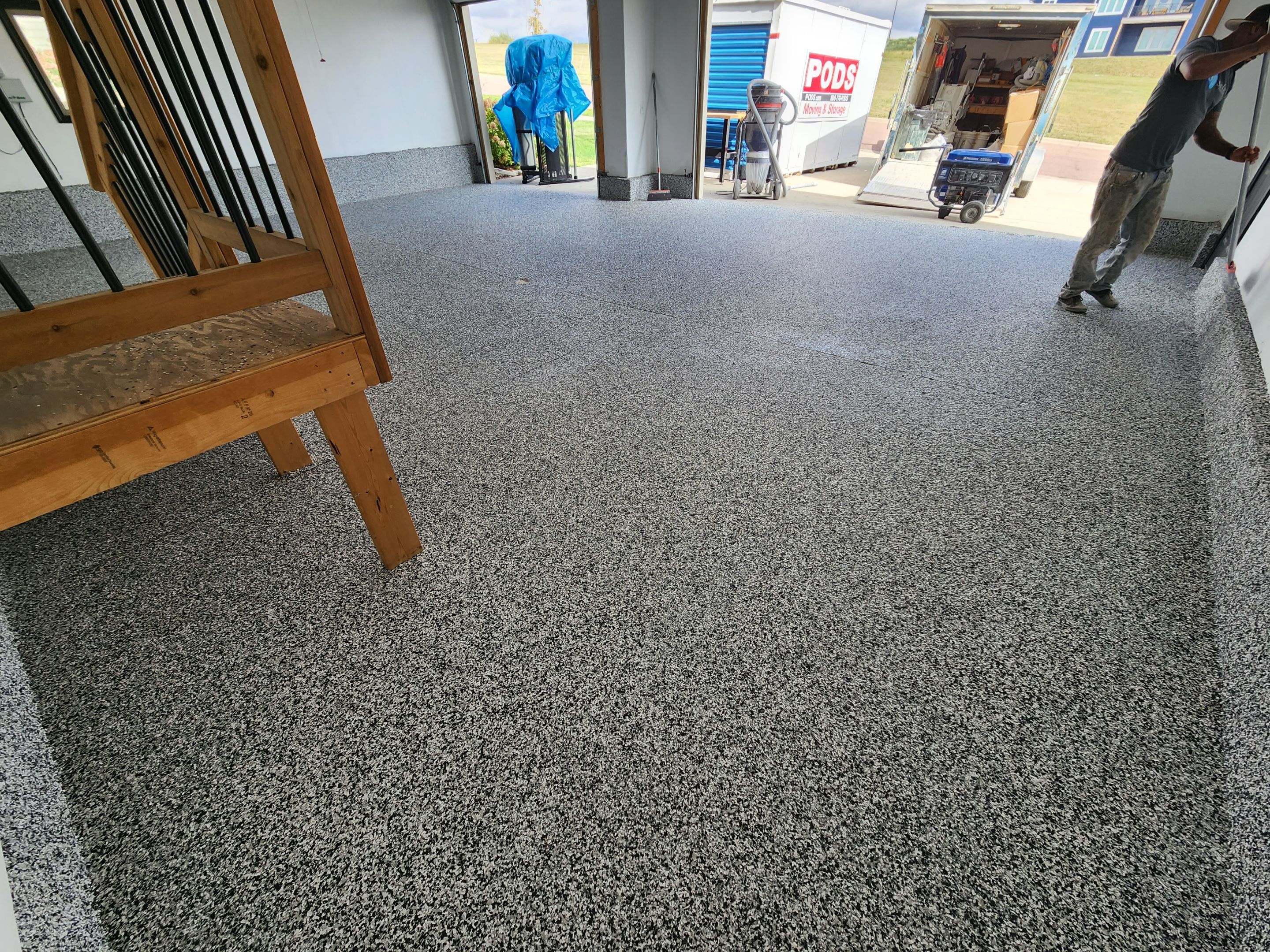Domino Flake Garage Floor Epoxy Coating in Brandon by Select Painting, Coatings & Garage Cabinets